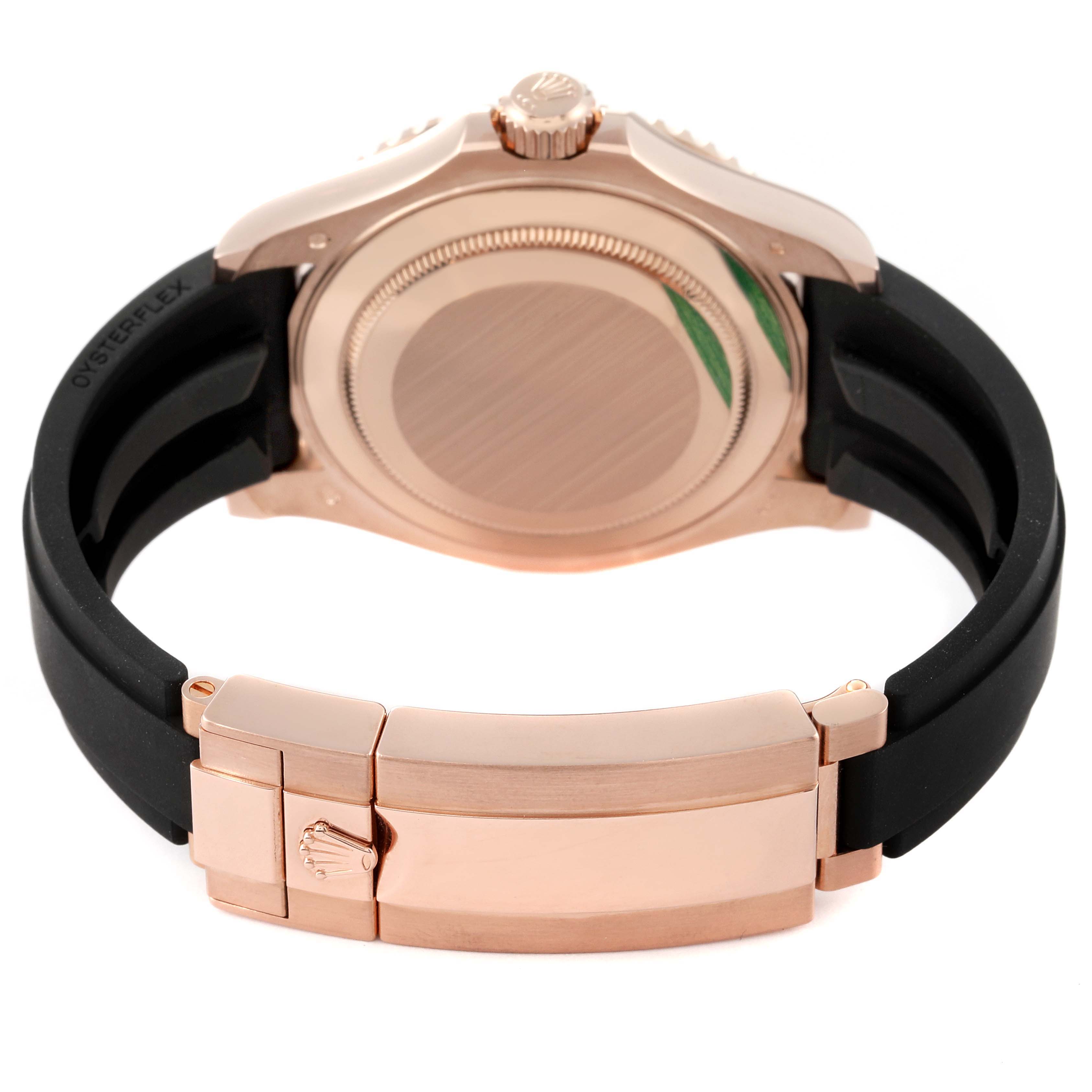 The image shows the back and clasp of the Rolex Yacht-Master 126655 Men's Rose Gold Black Dial 126655 Men's Rose Gold Black Dial watch with a black strap and rose gold accents.