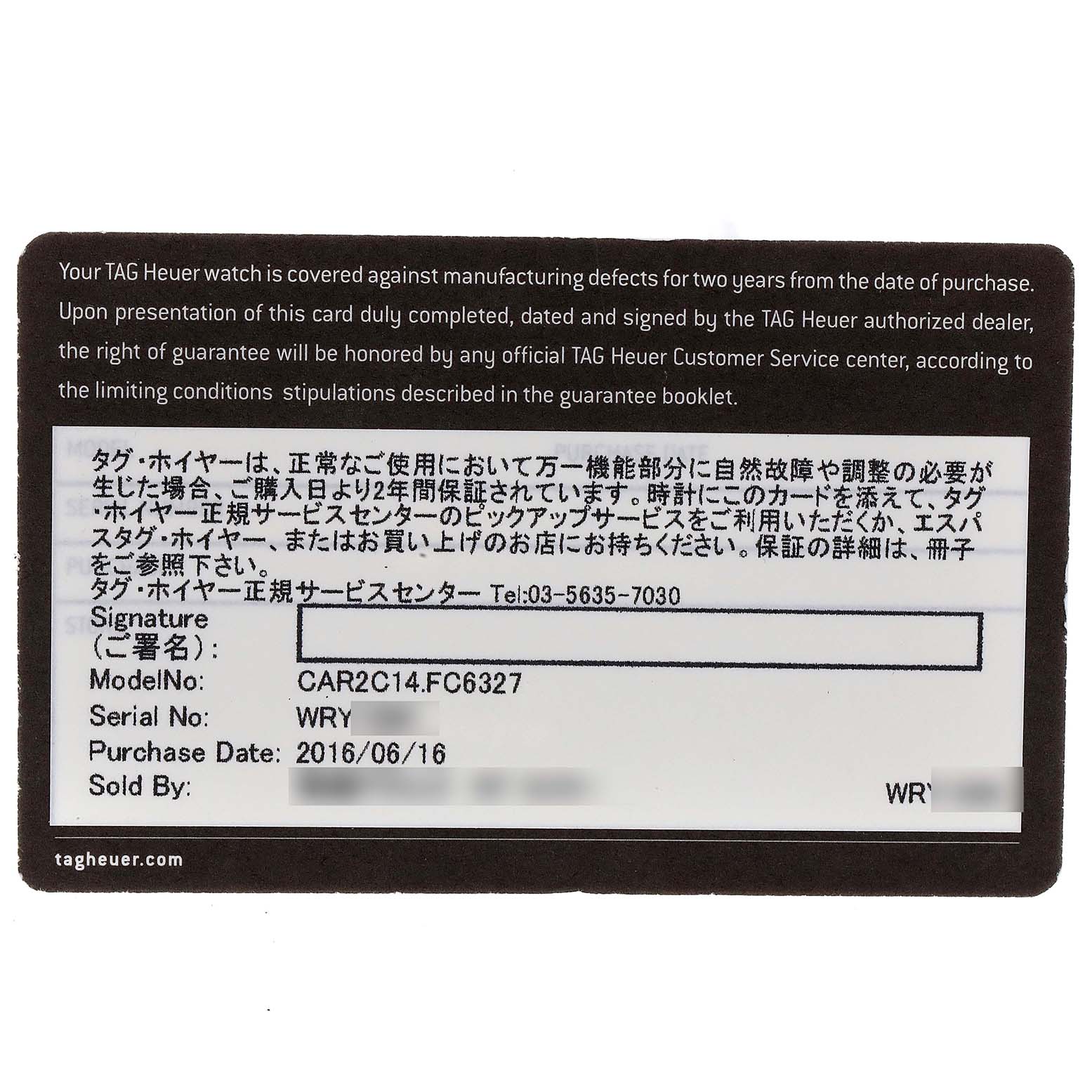 This image shows a close-up of a warranty card for a Tag Heuer Carrera CAR2C14 Men's Stainless Steel Grey Dial CAR2C14 Men's Stainless Steel Grey Dial model.