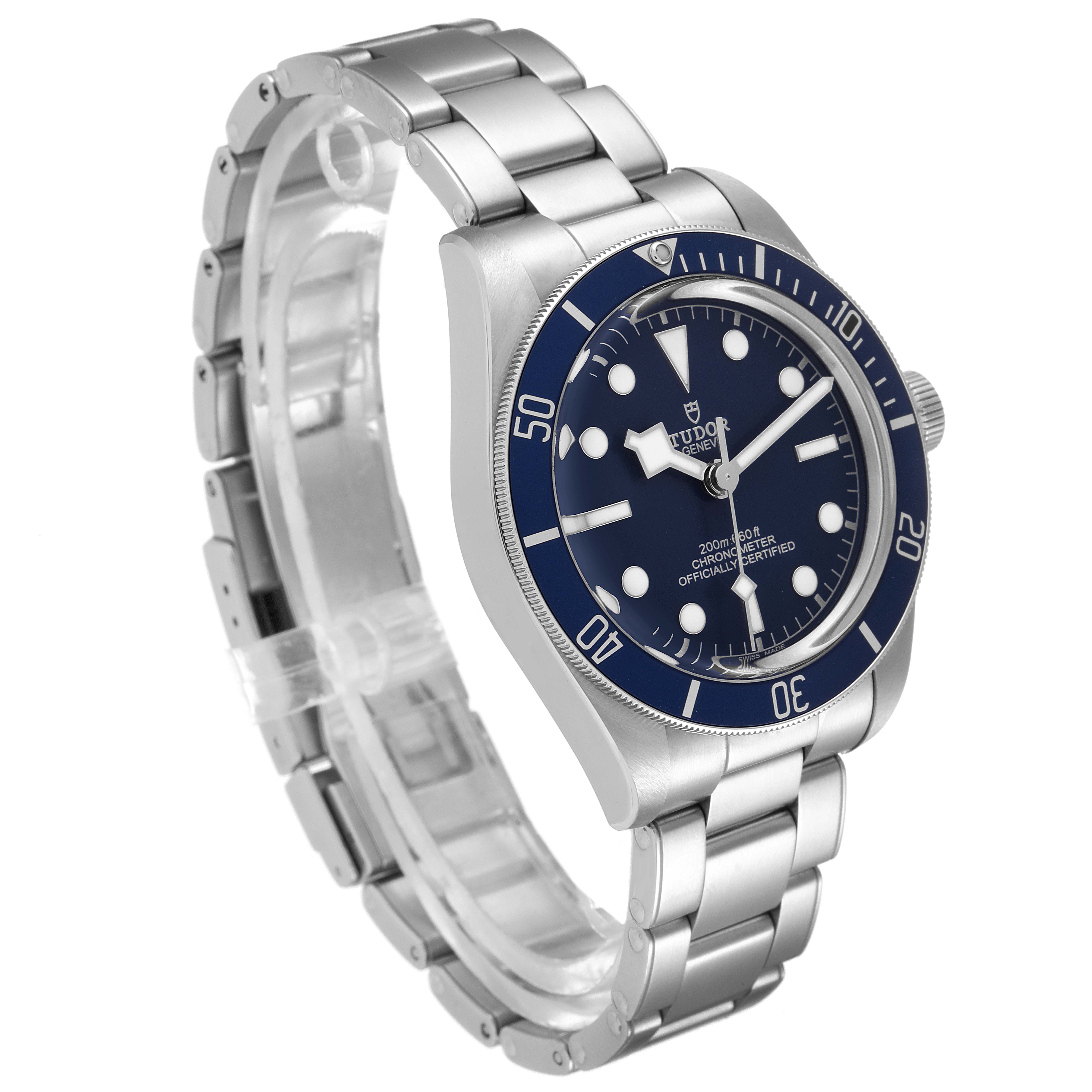 The image shows a Tudor Heritage Black Bay 79030B Men's Stainless Steel Blue Dial 79030B Men's Stainless Steel Blue Dial watch at a three-quarter angle, highlighting the face, metal bracelet, and bezel.
