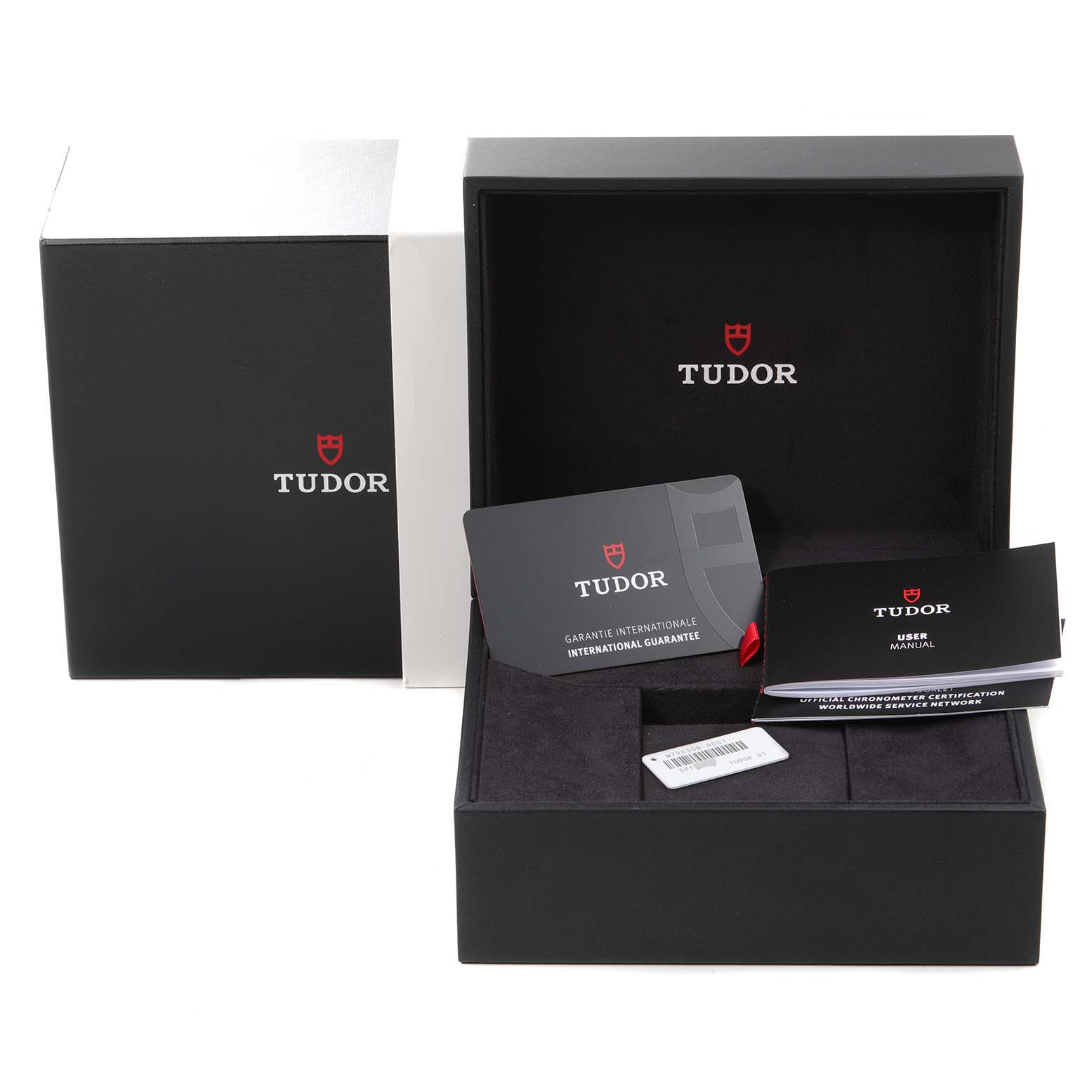 The image shows the packaging, user manual, and warranty card for the Tudor Heritage Black Bay 79030B Men's Stainless Steel Blue Dial 79030B Men's Stainless Steel Blue Dial watch from a front angle.