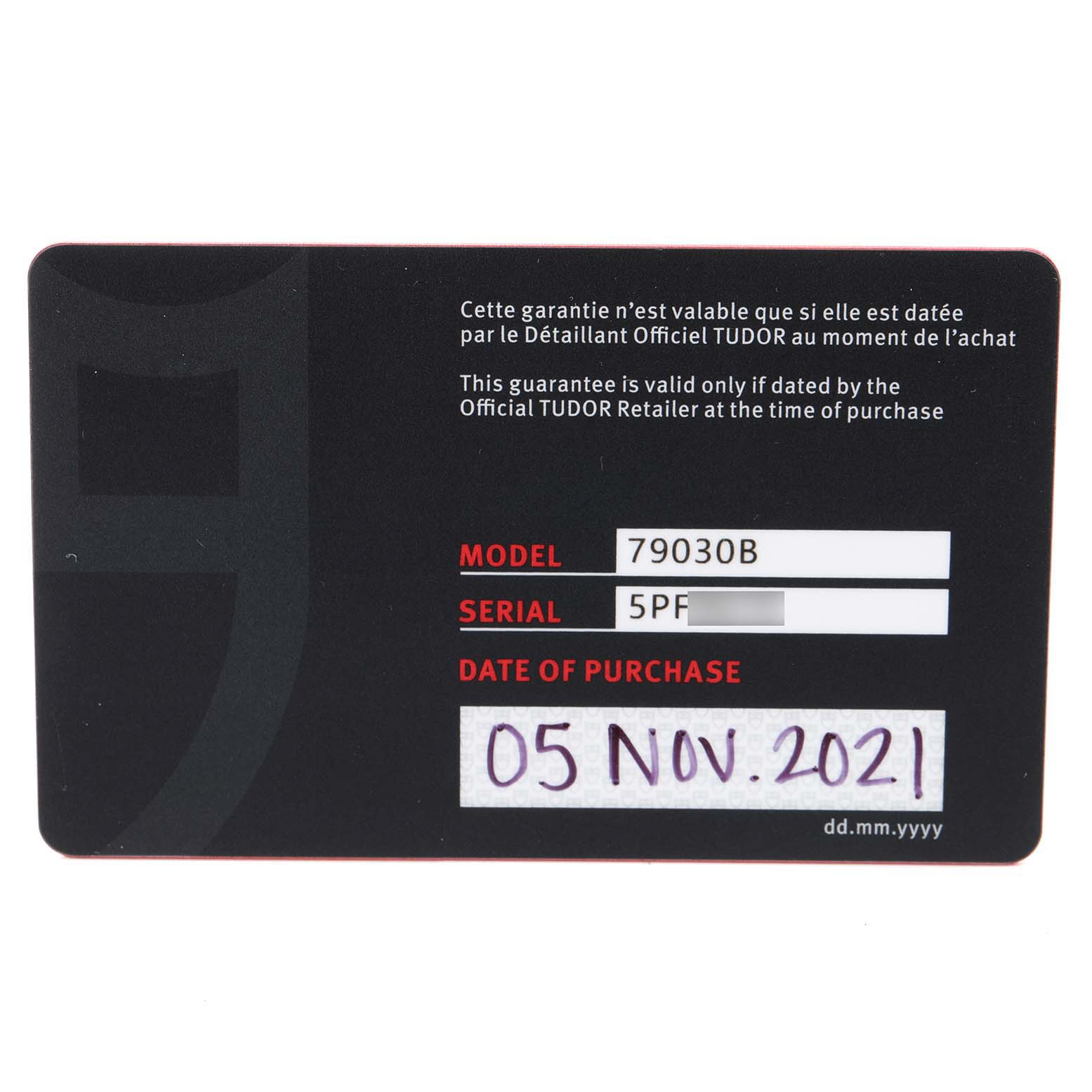 This image shows the warranty card for the Tudor Heritage Black Bay 79030B Men's Stainless Steel Blue Dial 79030B Men's Stainless Steel Blue Dial model 79030B, including the serial number and purchase date.