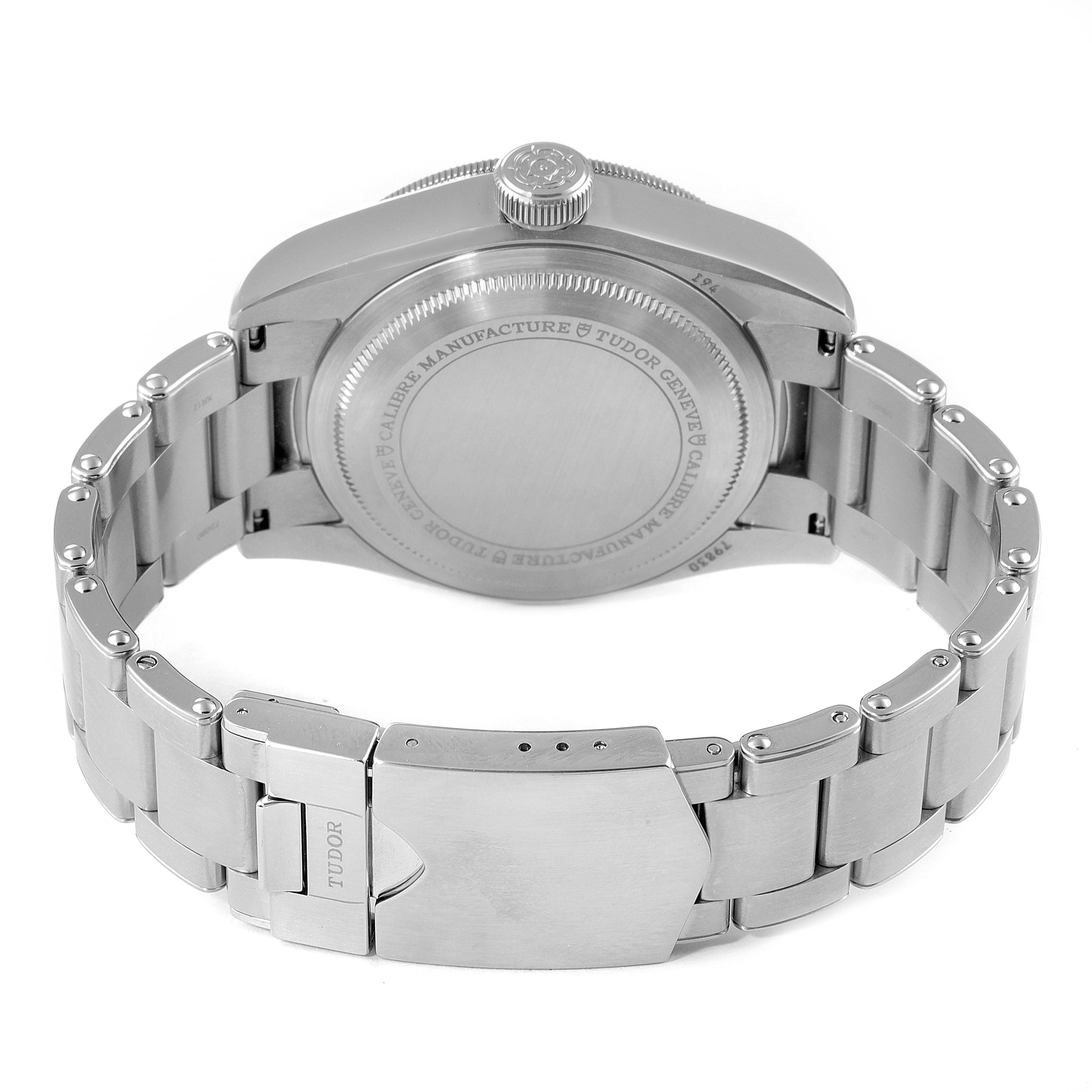 The image shows the back view of a Tudor Heritage Black Bay 79830RB Men's Stainless Steel Black Dial 79830RB Men's Stainless Steel Black Dial watch, highlighting its case back and stainless steel bracelet.