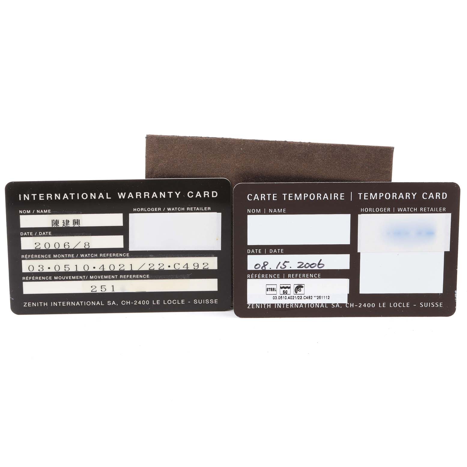 The image shows the International Warranty and Temporary Cards for the Zenith El Primero 03.0510.4021/01.C492 Men's Stainless Steel Black Dial 03.0510.4021/01.C492 Men's Stainless Steel Black Dial watch.