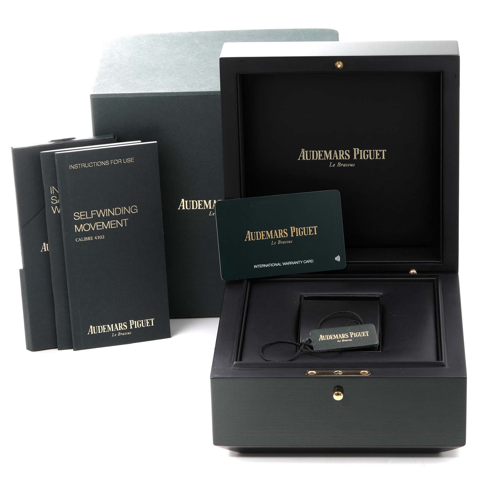 The image shows the packaging box, manuals, and warranty card for the Audemars Piguet Royal Oak 15500ST.OO.1220ST.03 Men's Stainless Steel Black Dial 15500ST.OO.1220ST.03 Men's Stainless Steel Black Dial model.