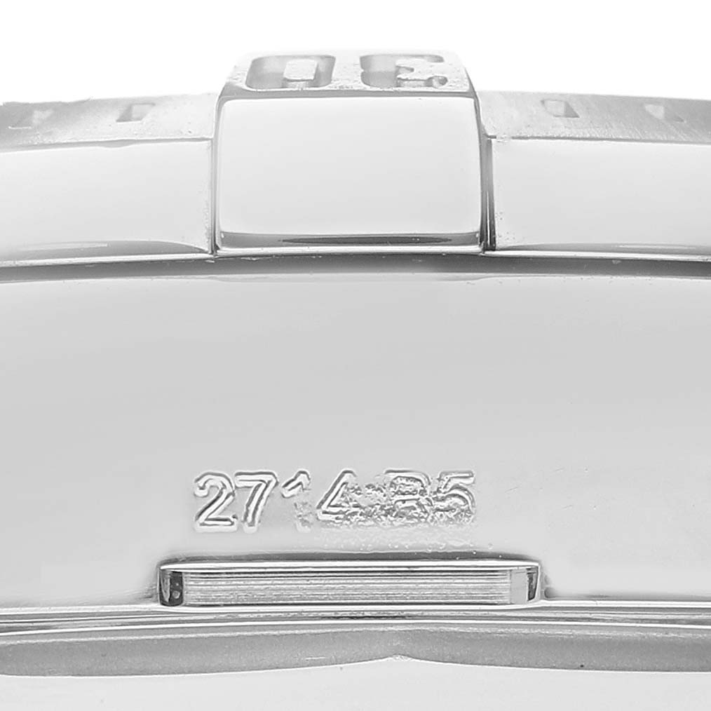The image shows a close-up of the back of the bezel and part of the case of a Breitling Colt A1738811/G791 Men
s Stainless Steel Silver Dial A1738811/G791 Men
s Stainless Steel Silver Dial watch, including a visible serial number.