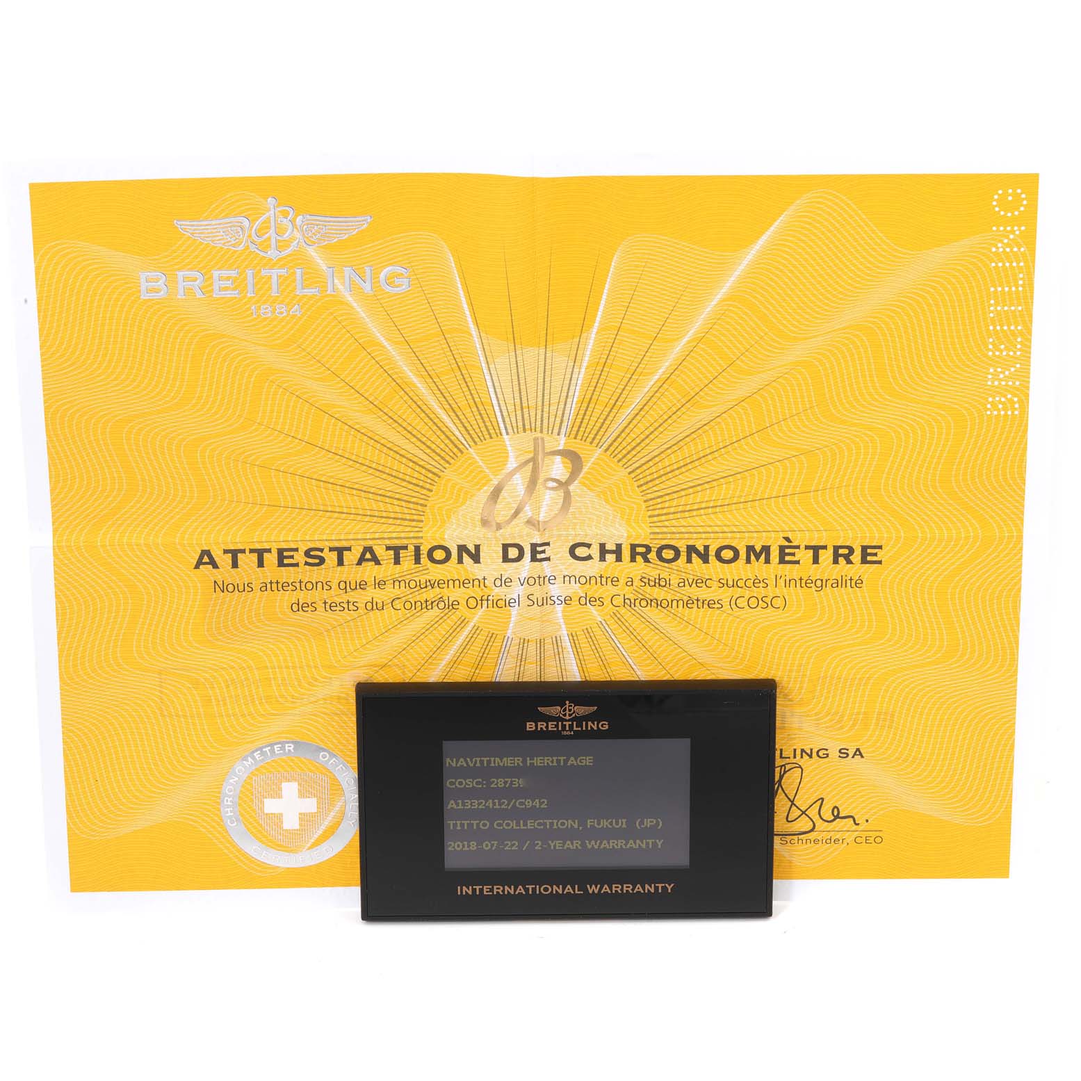 The image shows a Breitling Navitimer A13324 Men's Stainless Steel Blue Dial A13324 Men's Stainless Steel Blue Dial model warranty card and COSC certification, displayed frontally.