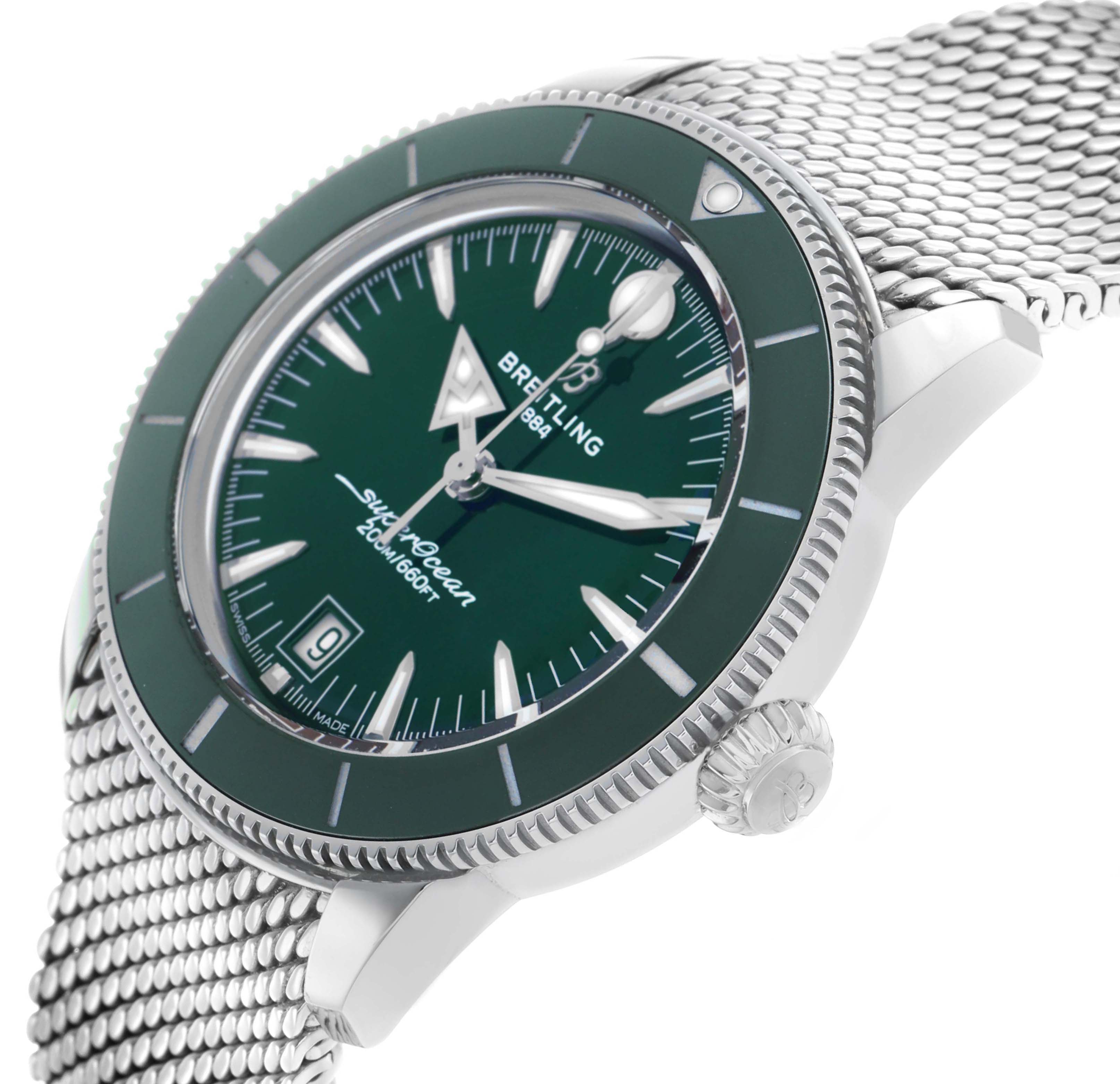 The Breitling Superocean AB3111 Men's Stainless Steel Green Dial watch is shown from an angled side view, highlighting the dial, bezel, crown, and mesh strap.