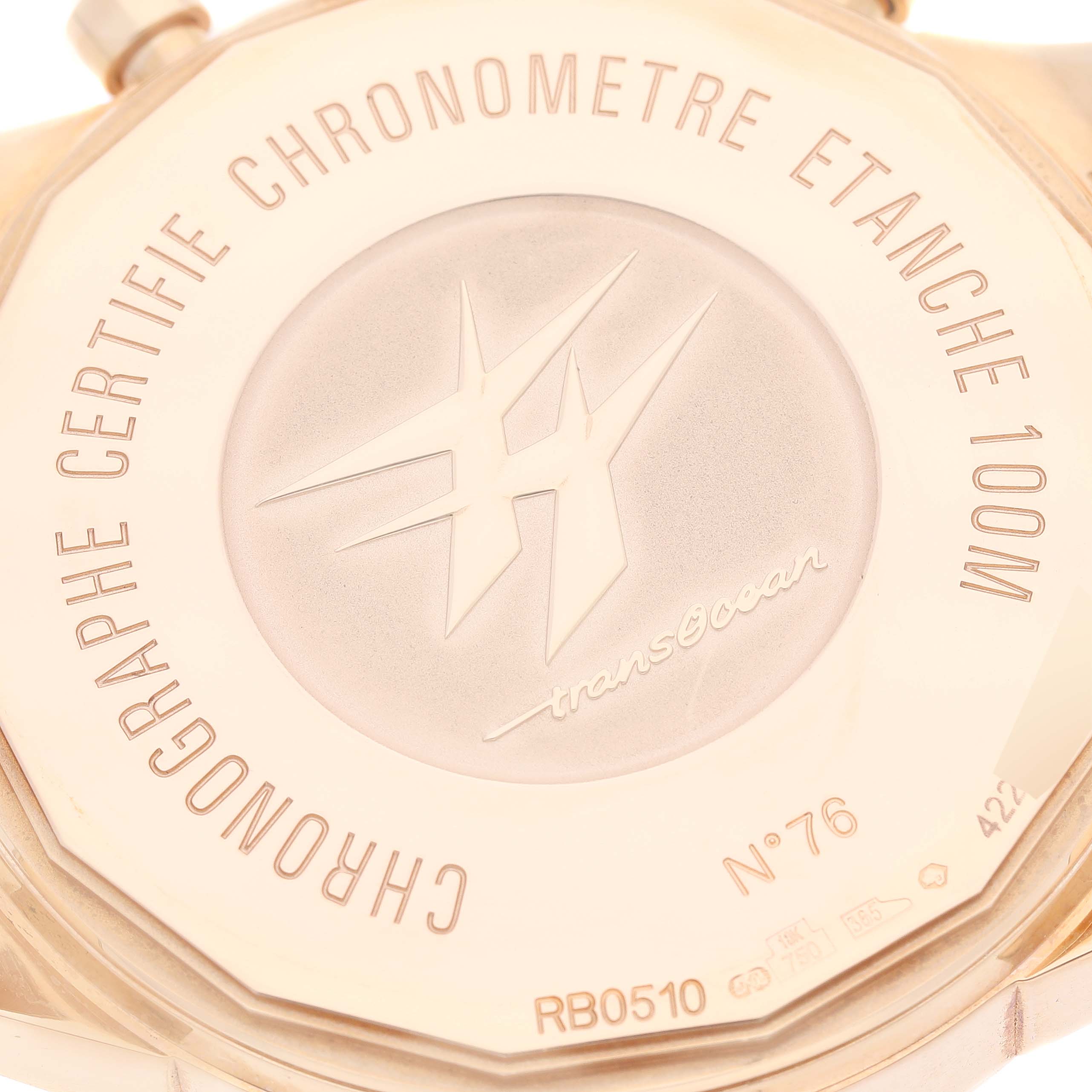 This image shows the case back of the Breitling Transocean RB0510 Men's Rose Gold White Dial RB0510 Men's Rose Gold White Dial watch, highlighting water resistance and model information.