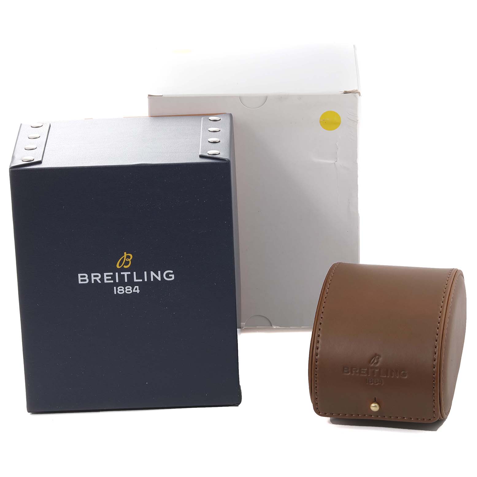 The image shows packaging and a leather case for a Breitling Transocean RB0510 Men's Rose Gold White Dial RB0510 Men's Rose Gold White Dial watch from a front angle.
