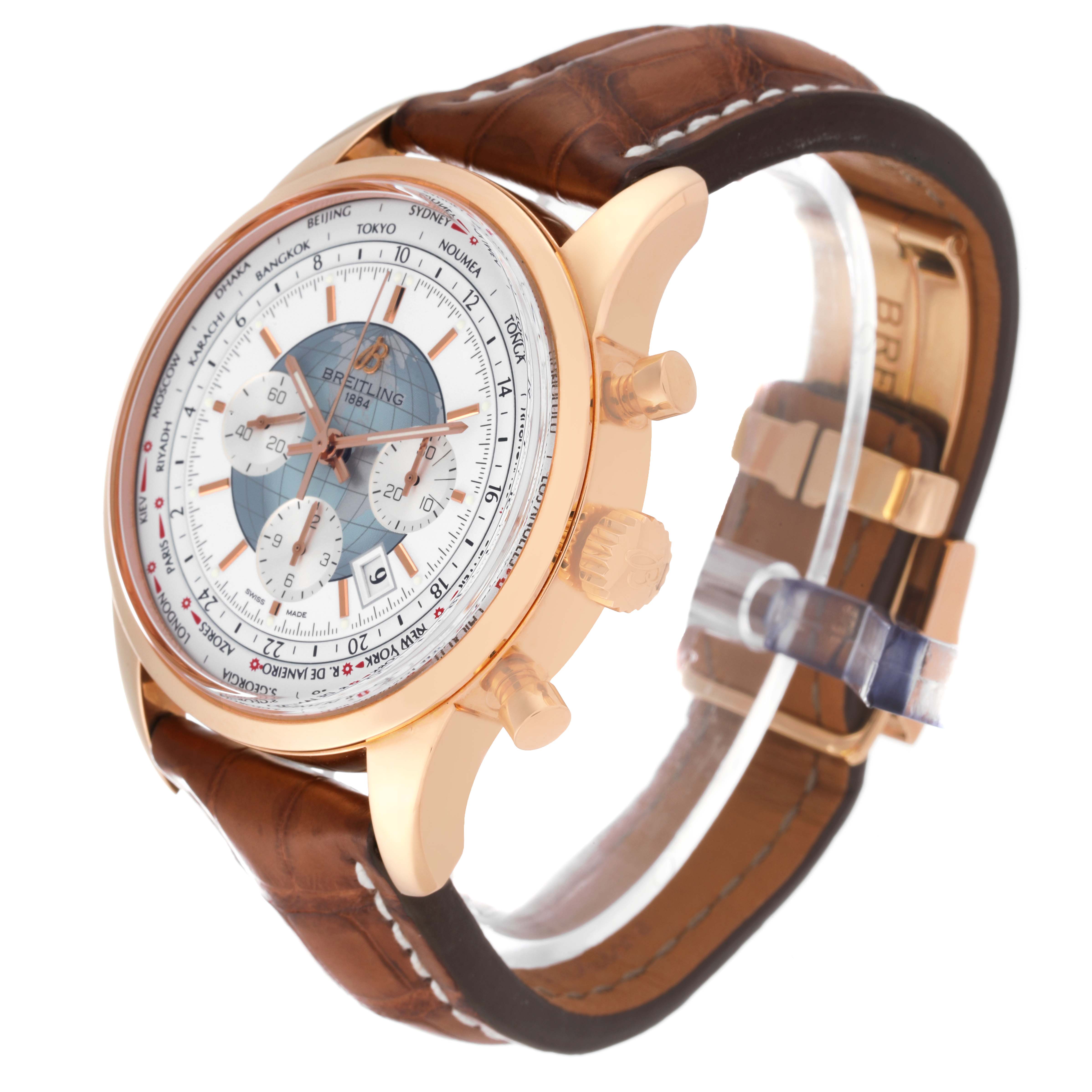 This image displays a Breitling Transocean RB0510 Men's Rose Gold White Dial RB0510 Men's Rose Gold White Dial watch at a slight angle, highlighting the face, case, crown, and leather strap.