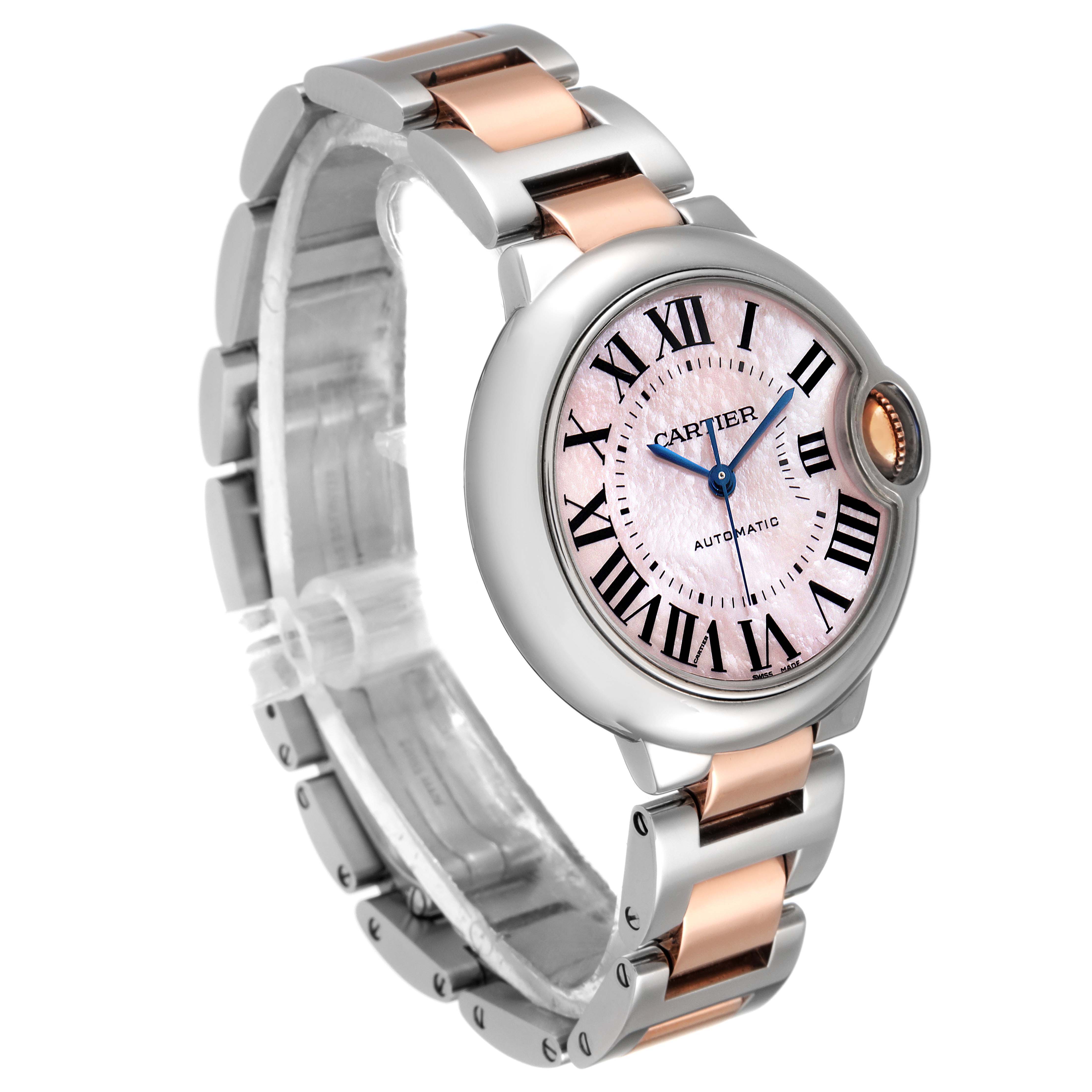 The image shows a side angle of a Cartier Ballon Bleu W6920098 Women's Steel and Gold (two tone) Mother of Pearl Dial W6920098 Women's Steel and Gold (two tone) Mother of Pearl Dial watch featuring its dial, band, and crown.
