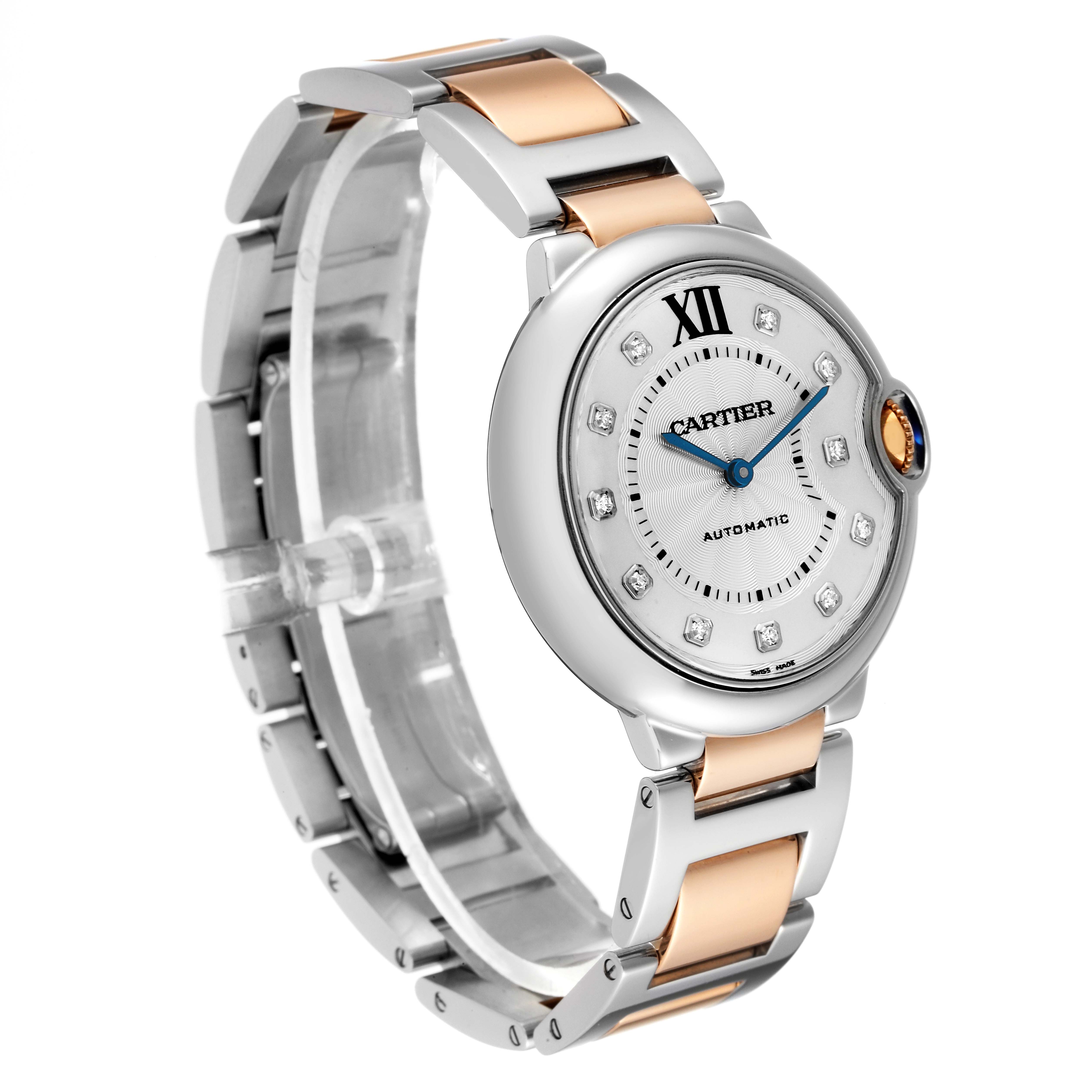 The image shows a Cartier Ballon Bleu W3BB0018 Women's Steel and Gold (two tone) Silver Dial W3BB0018 Women's Steel and Gold (two tone) Silver Dial watch at a three-quarter angle, displaying its face, crown, and two-tone bracelet.