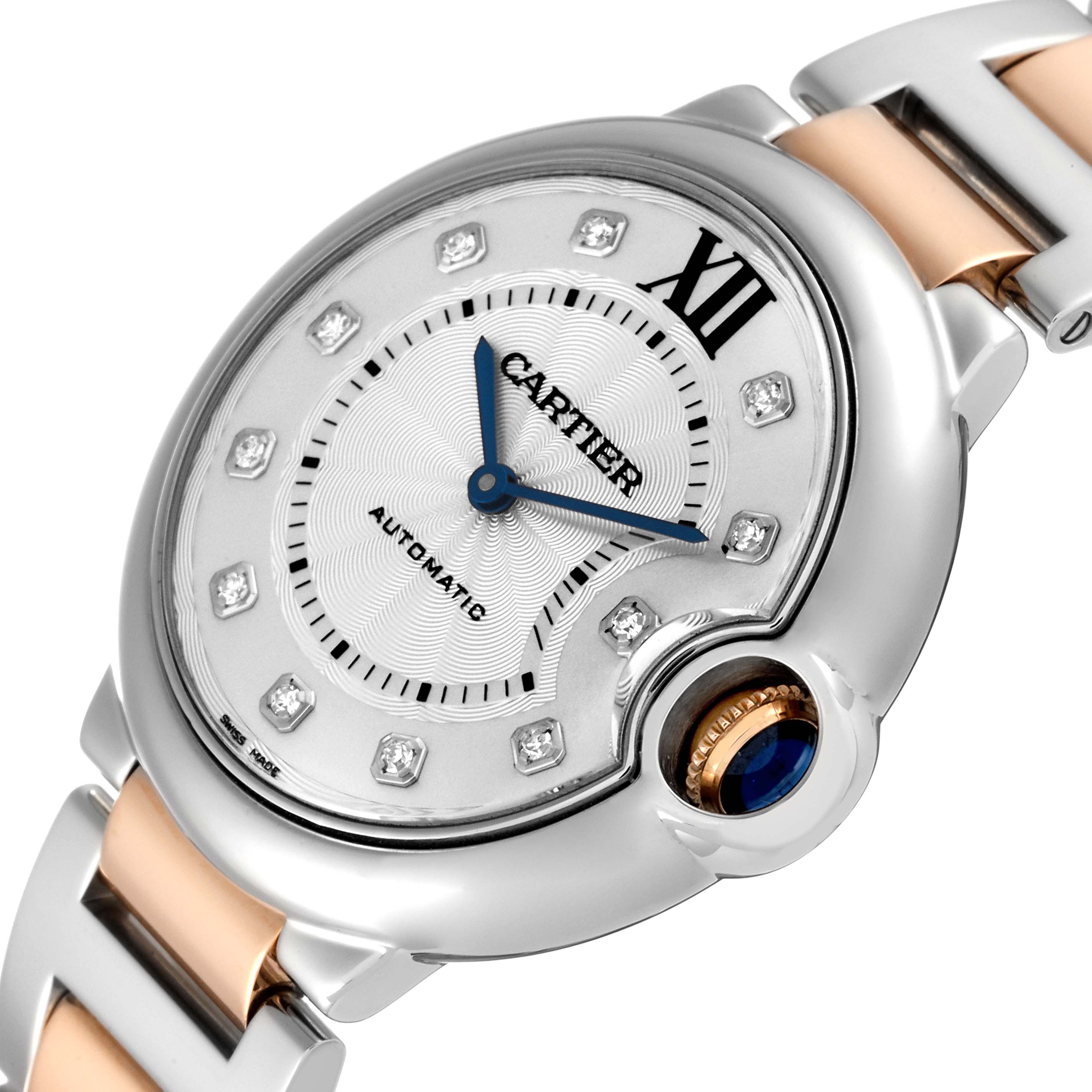 The Cartier Ballon Bleu W3BB0018 Women's Steel and Gold (two tone) Silver Dial W3BB0018 Women's Steel and Gold (two tone) Silver Dial watch is shown at an oblique angle, highlighting its dial, case, and part of the bracelet.