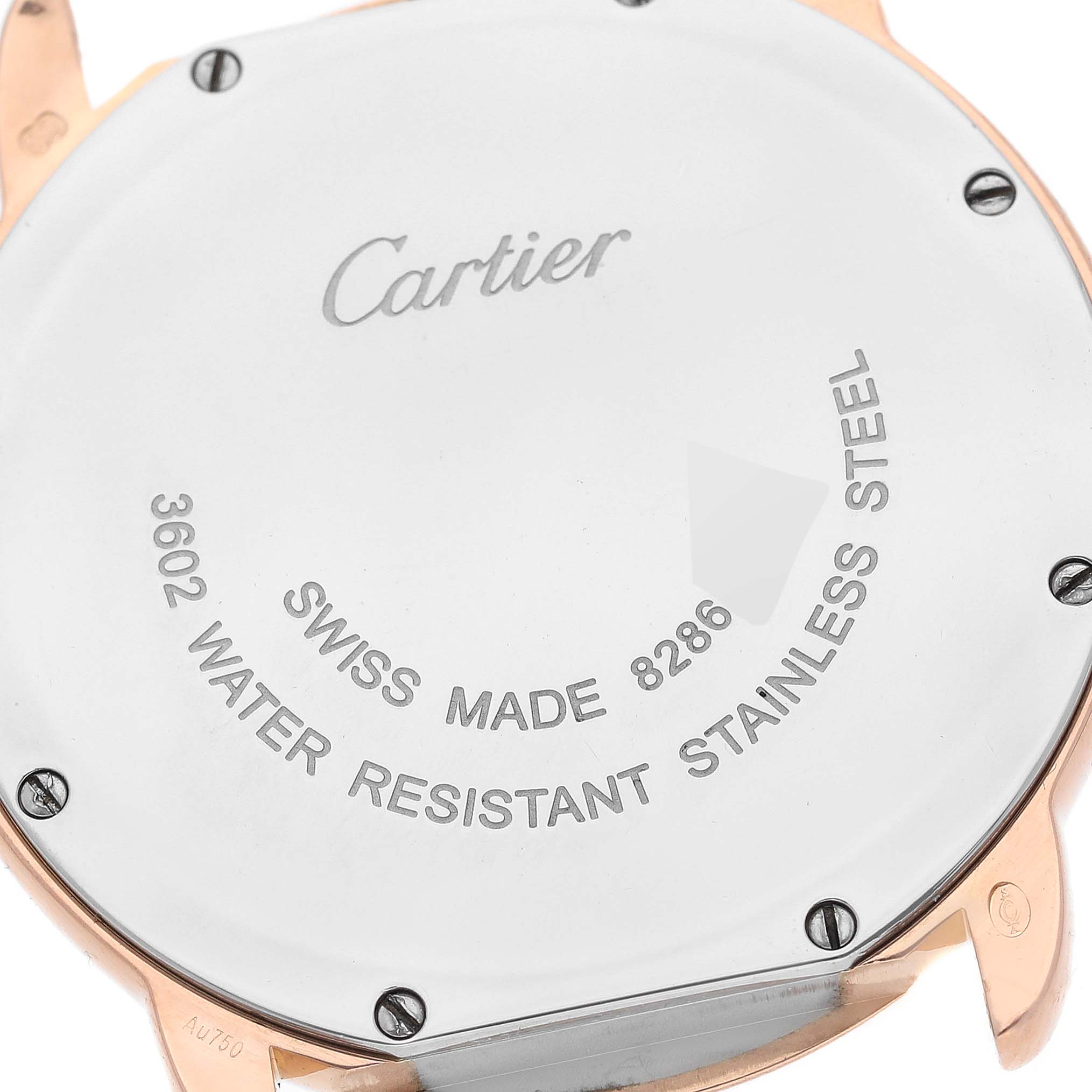 This image shows the back casing of a Cartier Ronde W6701008 Men
s Steel and Gold (two tone) Silver Dial W6701008 Men
s Steel and Gold (two tone) Silver Dial watch with inscriptions about its specifications.