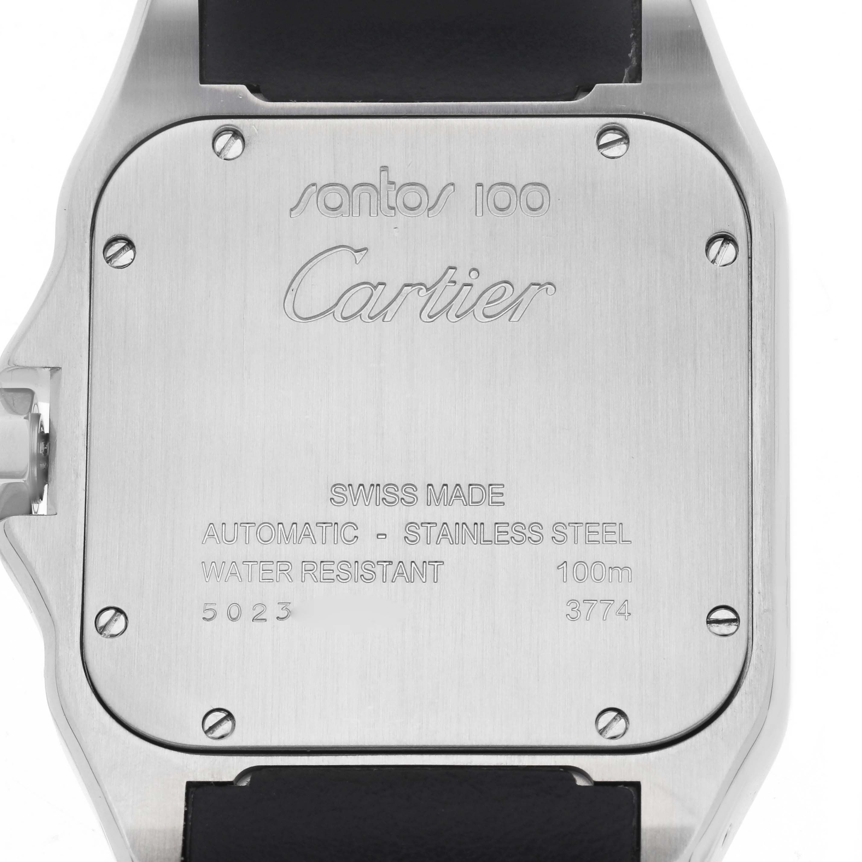The image shows the back case of a Cartier Santos W20073X8 Men's Stainless Steel Silver Dial 100 watch, highlighting its engravings and screws.