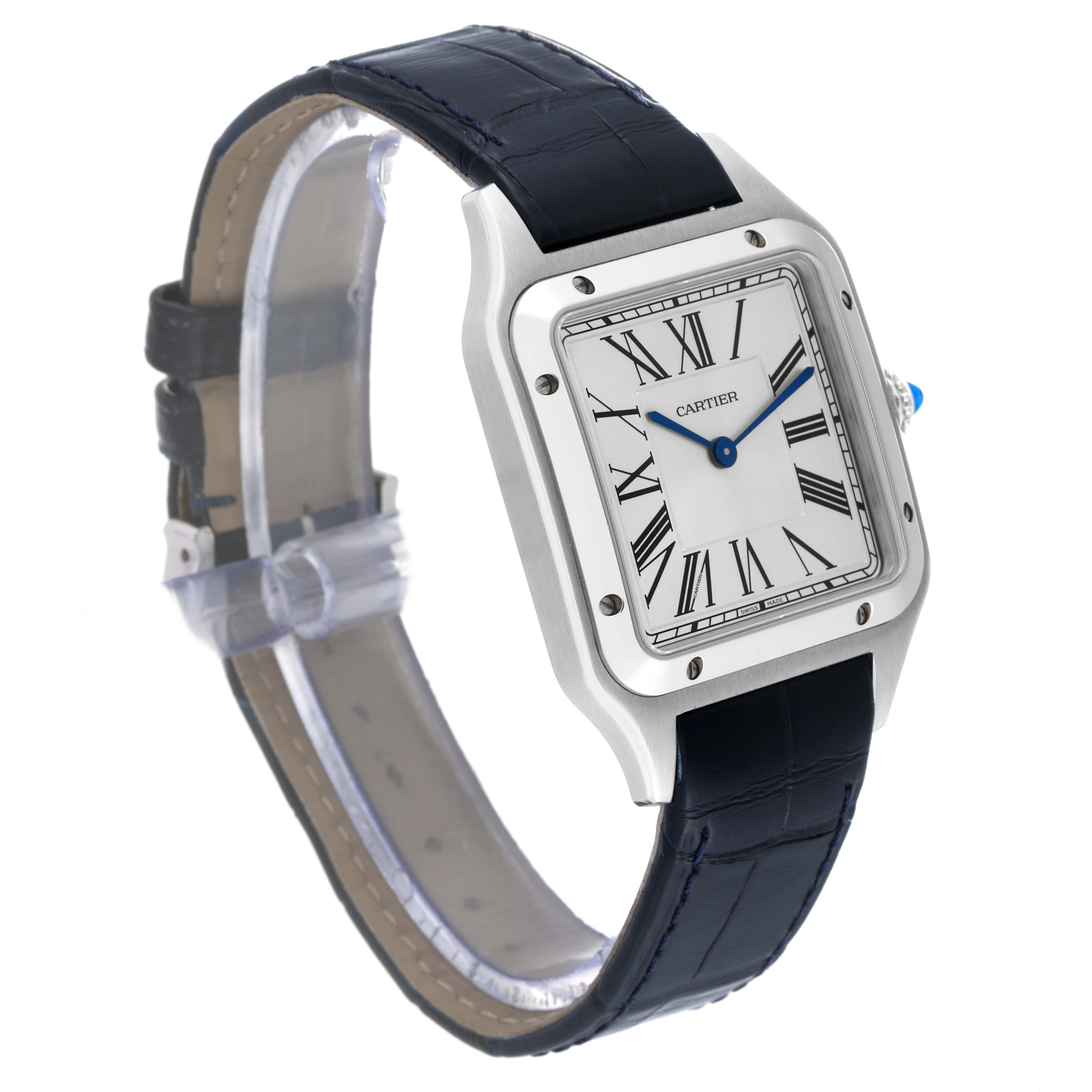 The image shows a side angle view of the Cartier Santos Dumont WSSA0022 Men
s Stainless Steel Silver Dial WSSA0022 Men
s Stainless Steel Silver Dial watch, highlighting its square face, Roman numerals, and black leather strap.