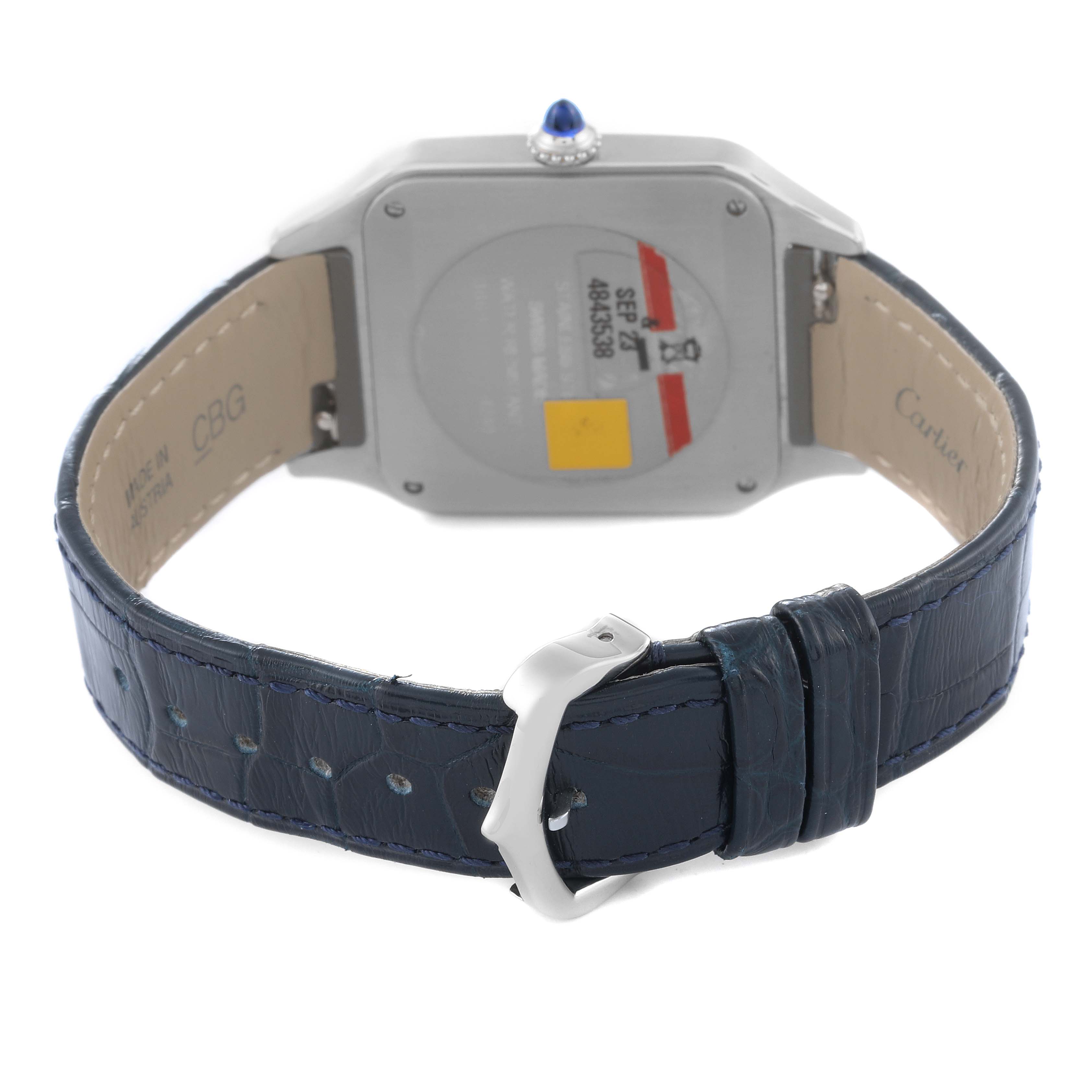 This image shows the back view of a Santos Dumont model by Cartier, displaying the case back and leather strap with a buckle.