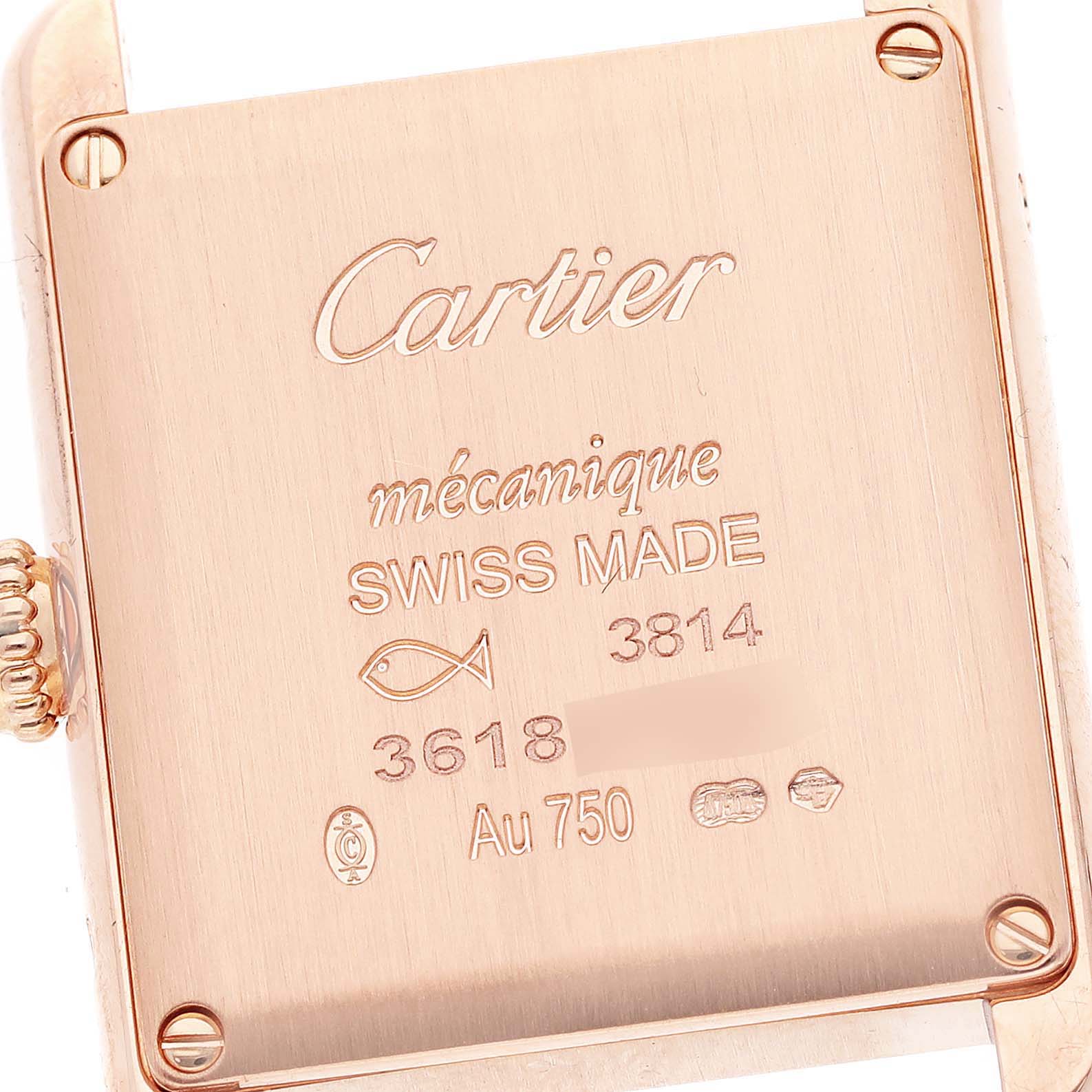 The image shows the back case of a Cartier Tank Louis WGTA0010 Women's Rose Gold Silver Dial WGTA0010 Women's Rose Gold Silver Dial watch with inscriptions and the crown partially visible.