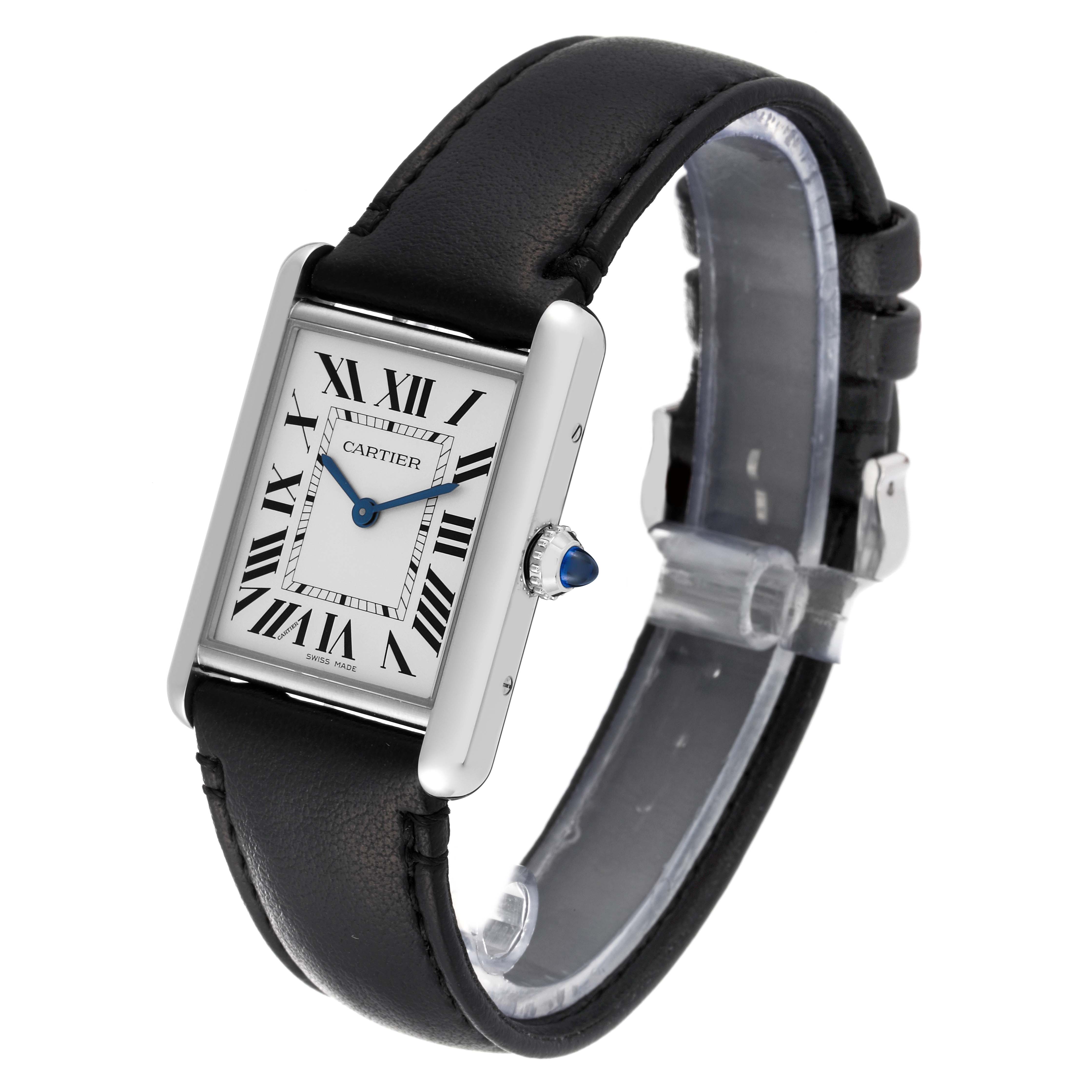 The image shows a Cartier Tank Must WSTA0059 Women's Stainless Steel Silver Dial WSTA0059 Women's Stainless Steel Silver Dial watch from a three-quarter angle, highlighting its dial, case, crown, and black leather strap.