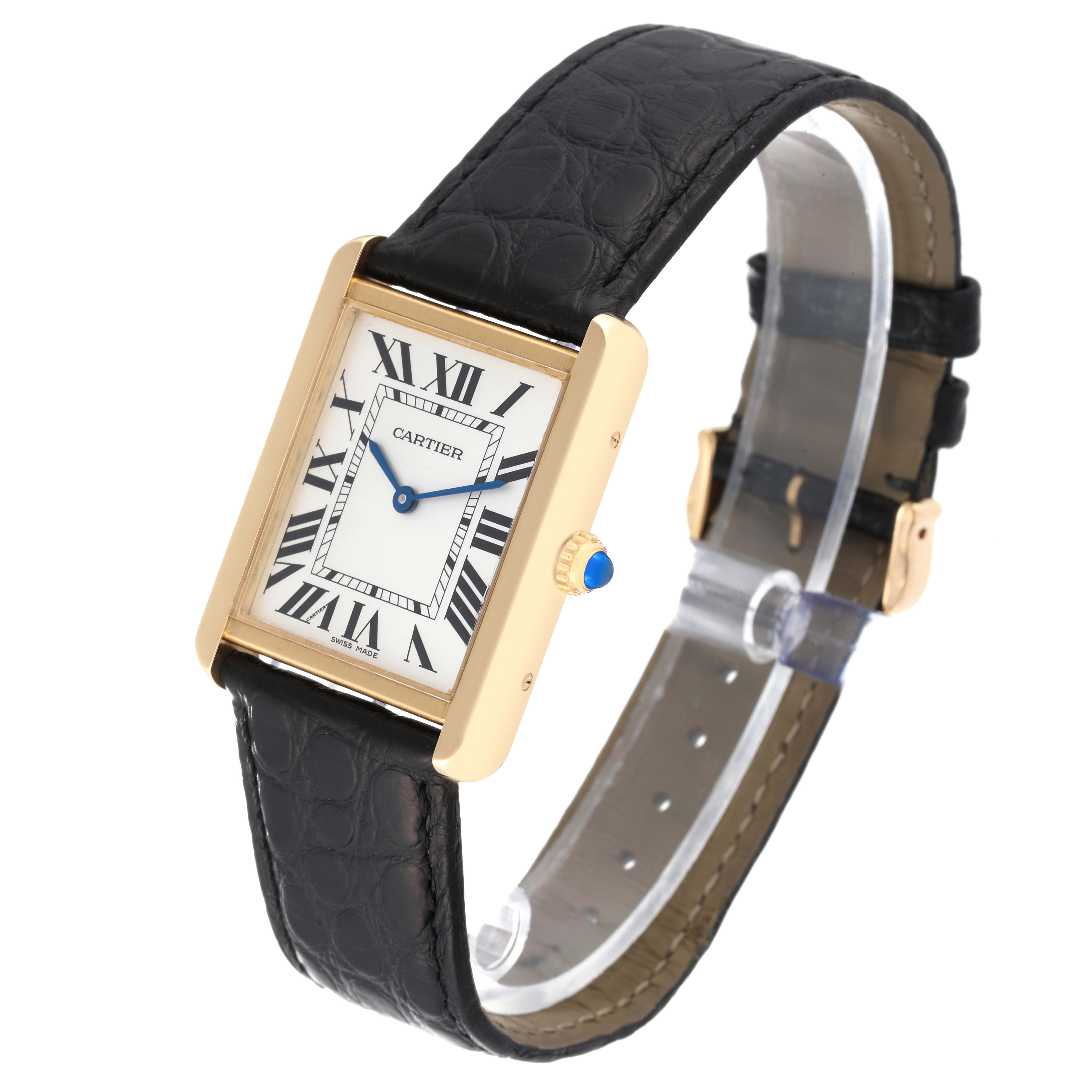 This image shows a Cartier Tank Solo W5200004 Men's Steel and Gold (two tone) Silver Dial W5200004 Men's Steel and Gold (two tone) Silver Dial watch with a black leather strap and a rectangular face at an angled view.