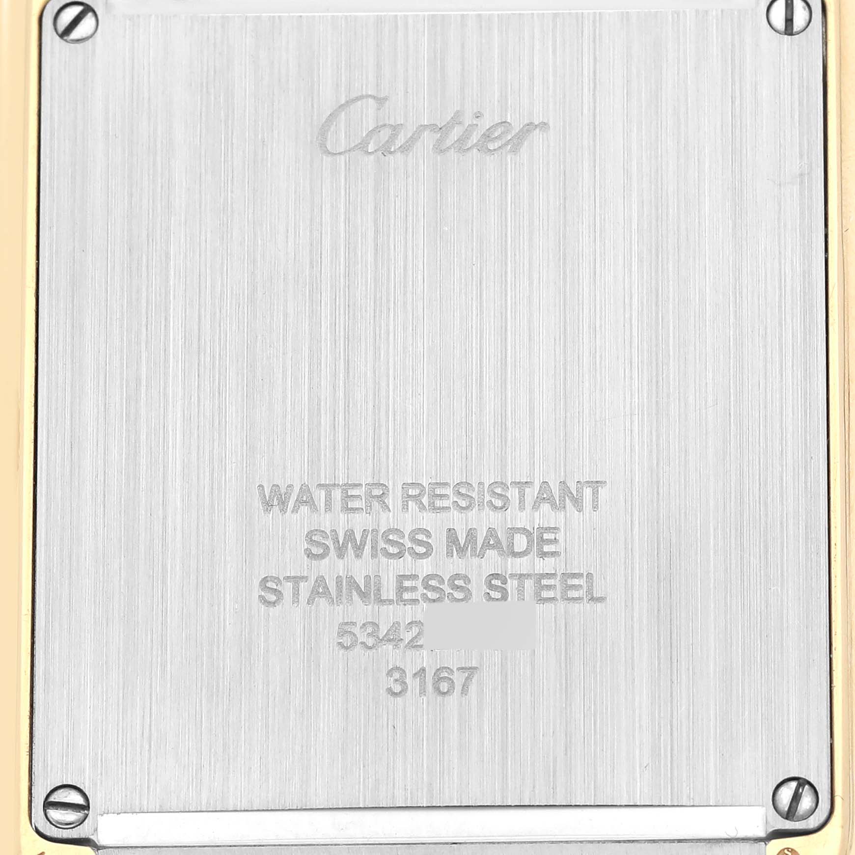 This image shows the back case of a Cartier Tank Solo W5200004 Men's Steel and Gold (two tone) Silver Dial W5200004 Men's Steel and Gold (two tone) Silver Dial watch, featuring text about water resistance, Swiss manufacture, and materials.