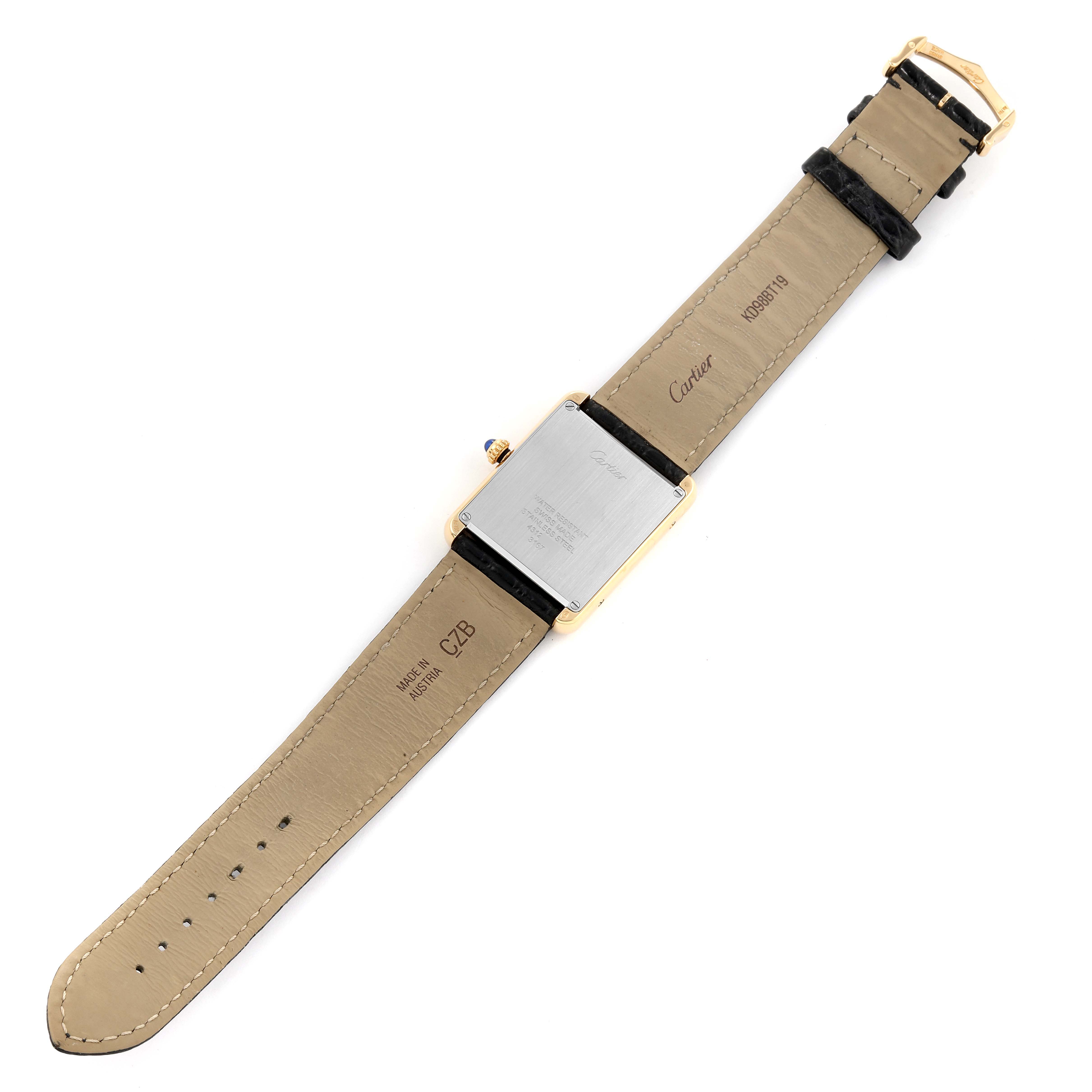 The image shows the back view of a Cartier Tank Solo W5200004 Men
s Steel and Gold (two tone) Silver Dial W5200004 Men
s Steel and Gold (two tone) Silver Dial watch, displaying the case back and leather straps.