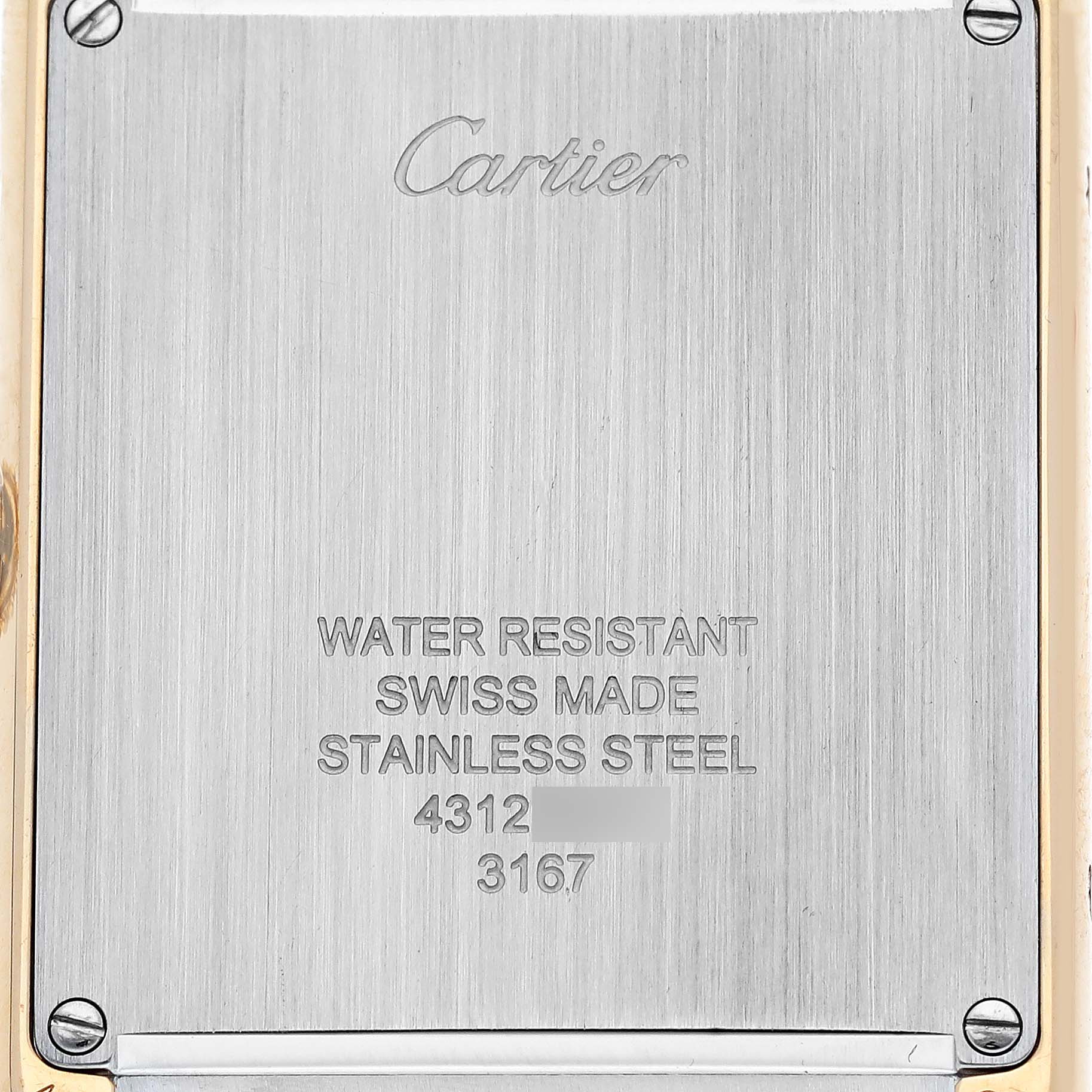 This image shows the back case of a Cartier Tank Solo W5200004 Men
s Steel and Gold (two tone) Silver Dial W5200004 Men
s Steel and Gold (two tone) Silver Dial watch, highlighting its water resistance, Swiss origin, and stainless steel material.