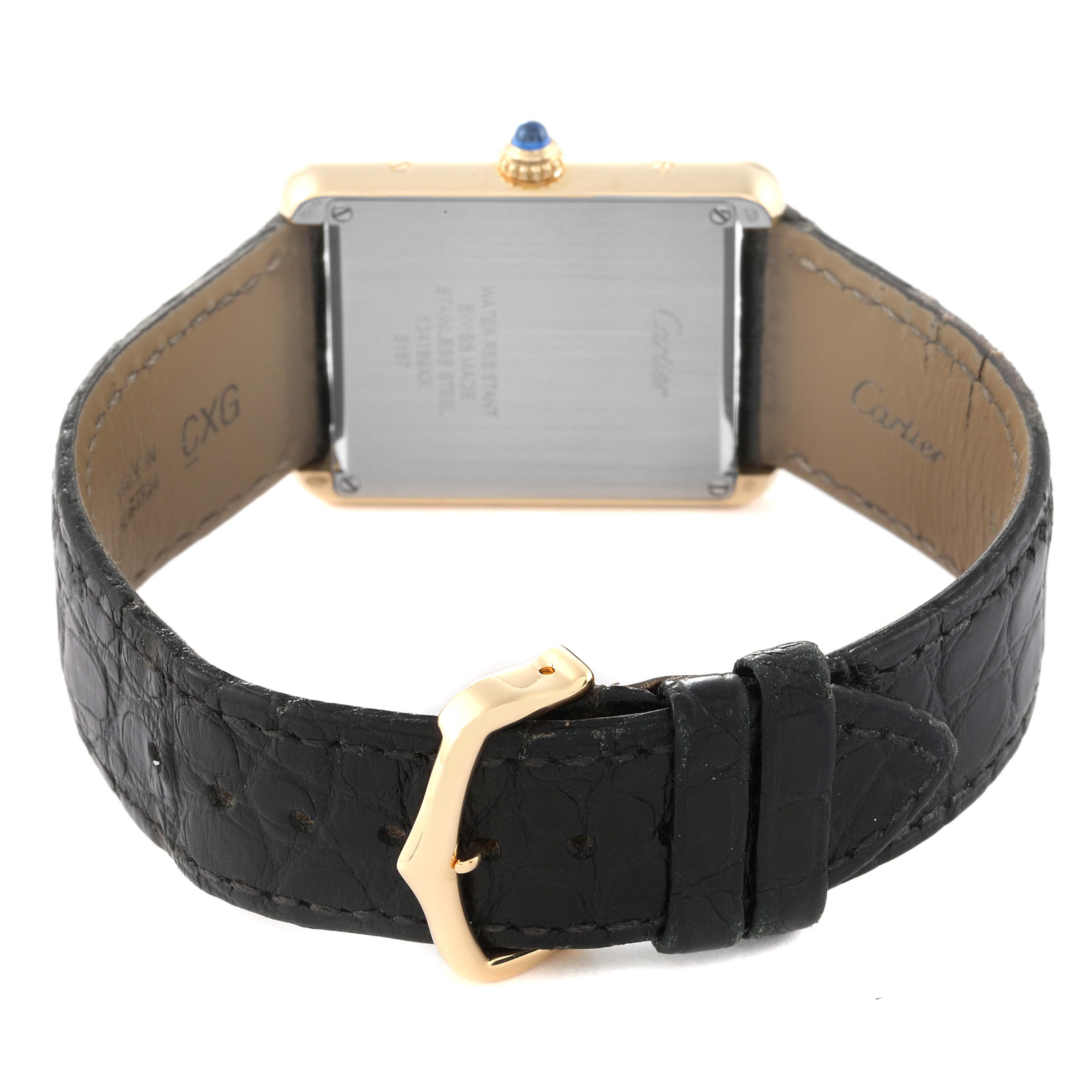 The image shows the back view of a Cartier Tank Solo W5200004 Men
s Steel and Gold (two tone) Silver Dial W5200004 Men
s Steel and Gold (two tone) Silver Dial watch, highlighting the case back, strap, and buckle.