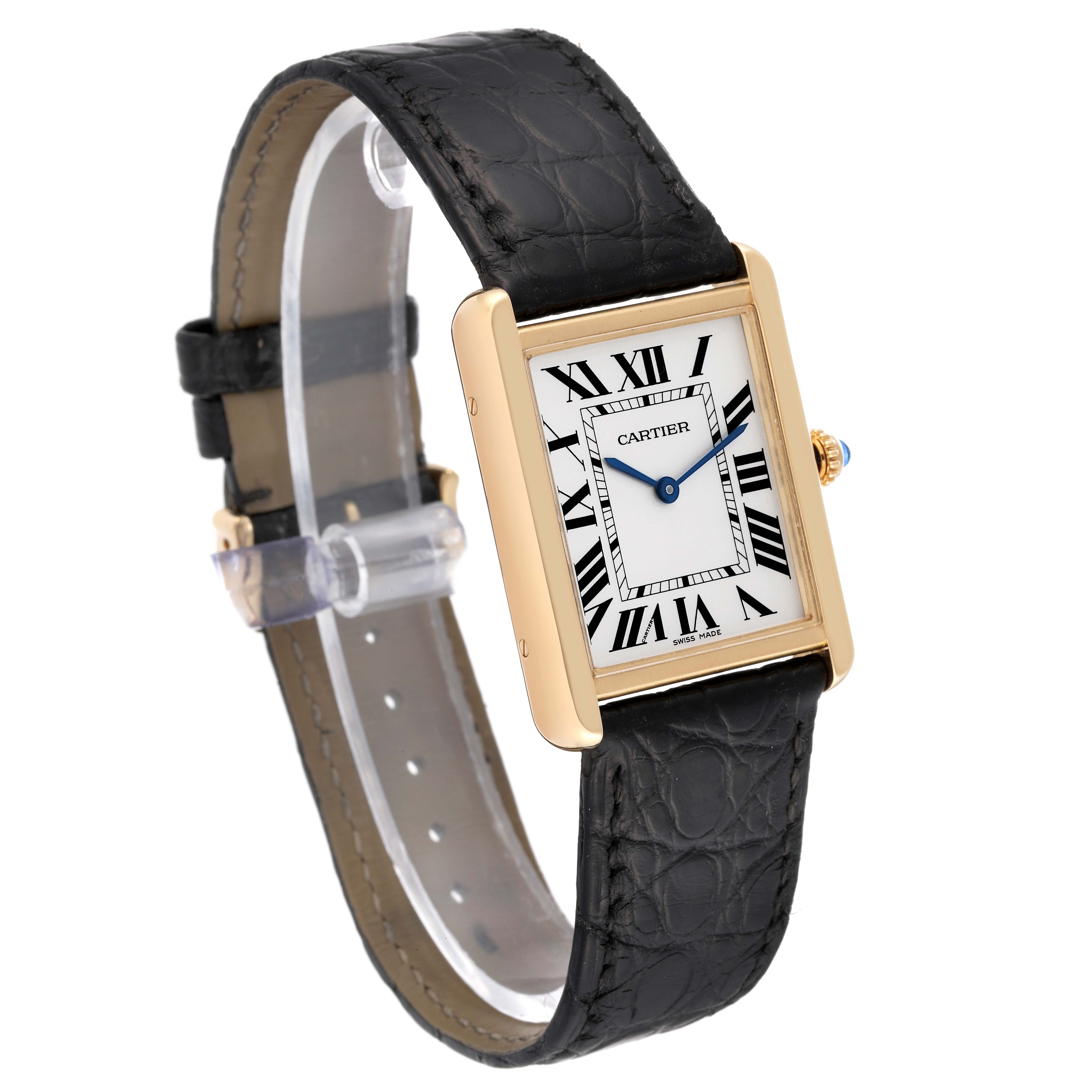 The image shows a Tank Solo model by Cartier from an angled side view, displaying the watch face and black leather strap.