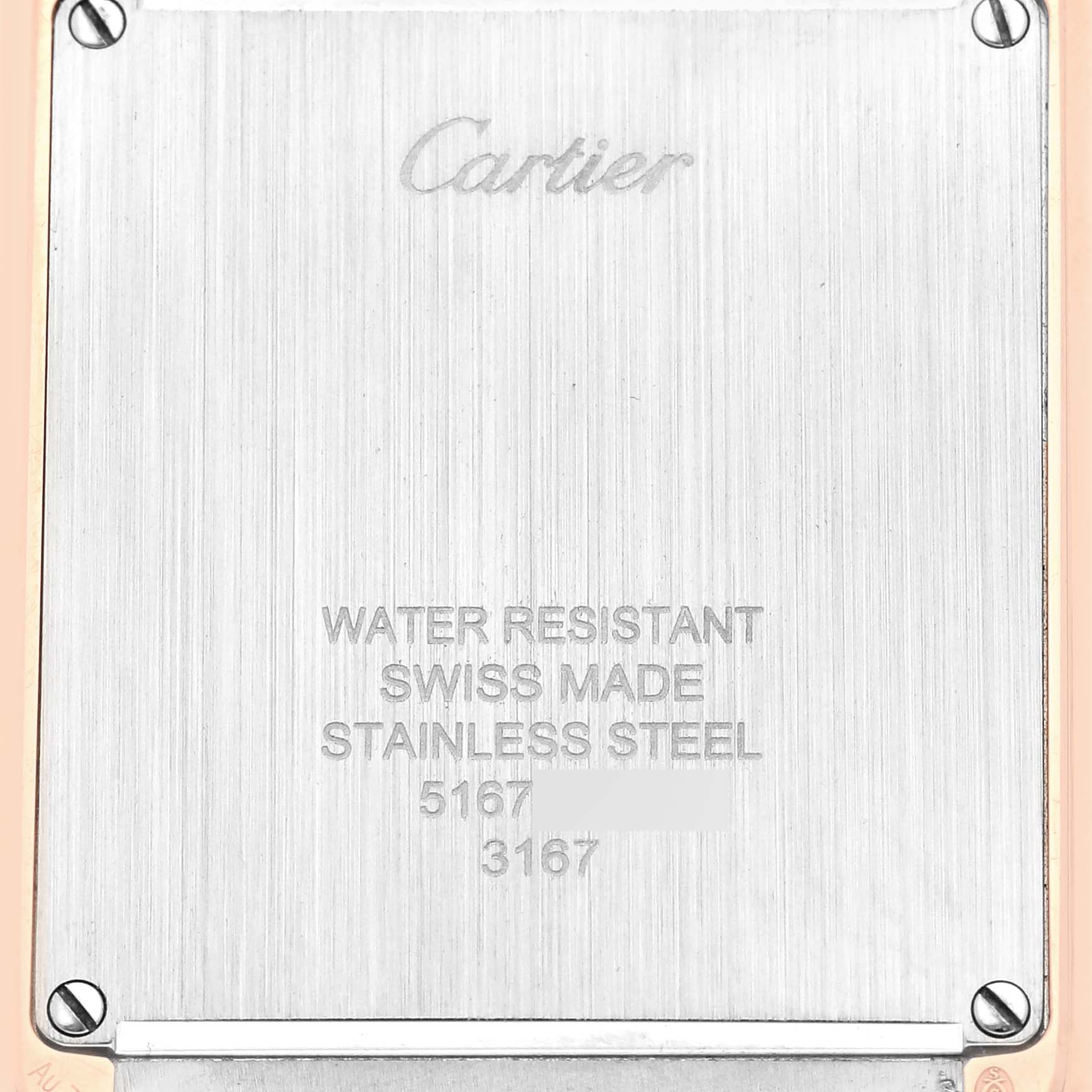 The image shows the back case of a Cartier Tank Solo W5200025 Men's Steel and Gold (two tone) Silver Dial W5200025 Men's Steel and Gold (two tone) Silver Dial watch, highlighting its water resistance, material, and serial numbers.