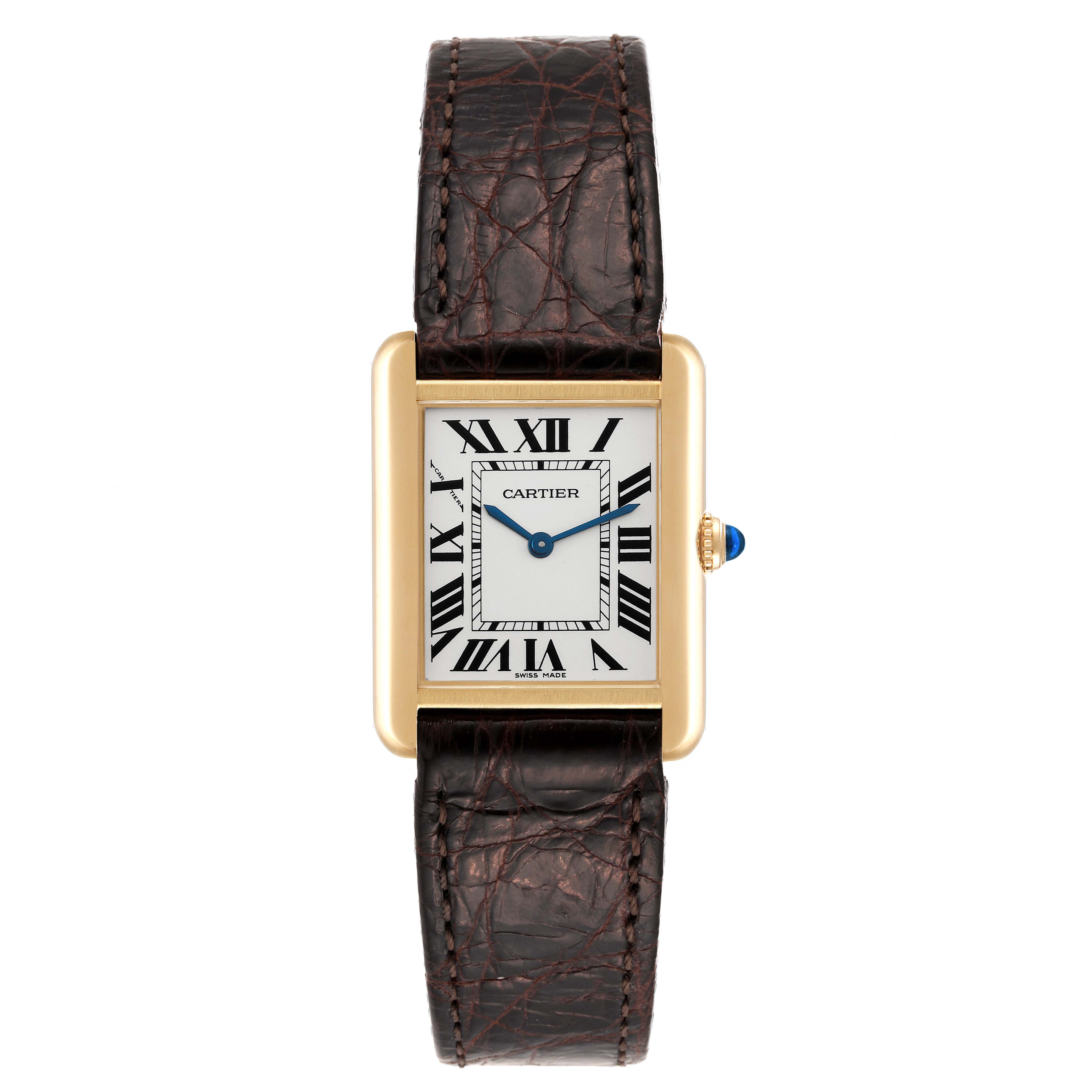 The image shows a top-down view of a Cartier Tank Solo W1018755 Women
s Steel and Gold (two tone) Silver Dial W1018755 Women
s Steel and Gold (two tone) Silver Dial watch with a gold case, Roman numerals, and a brown leather strap.