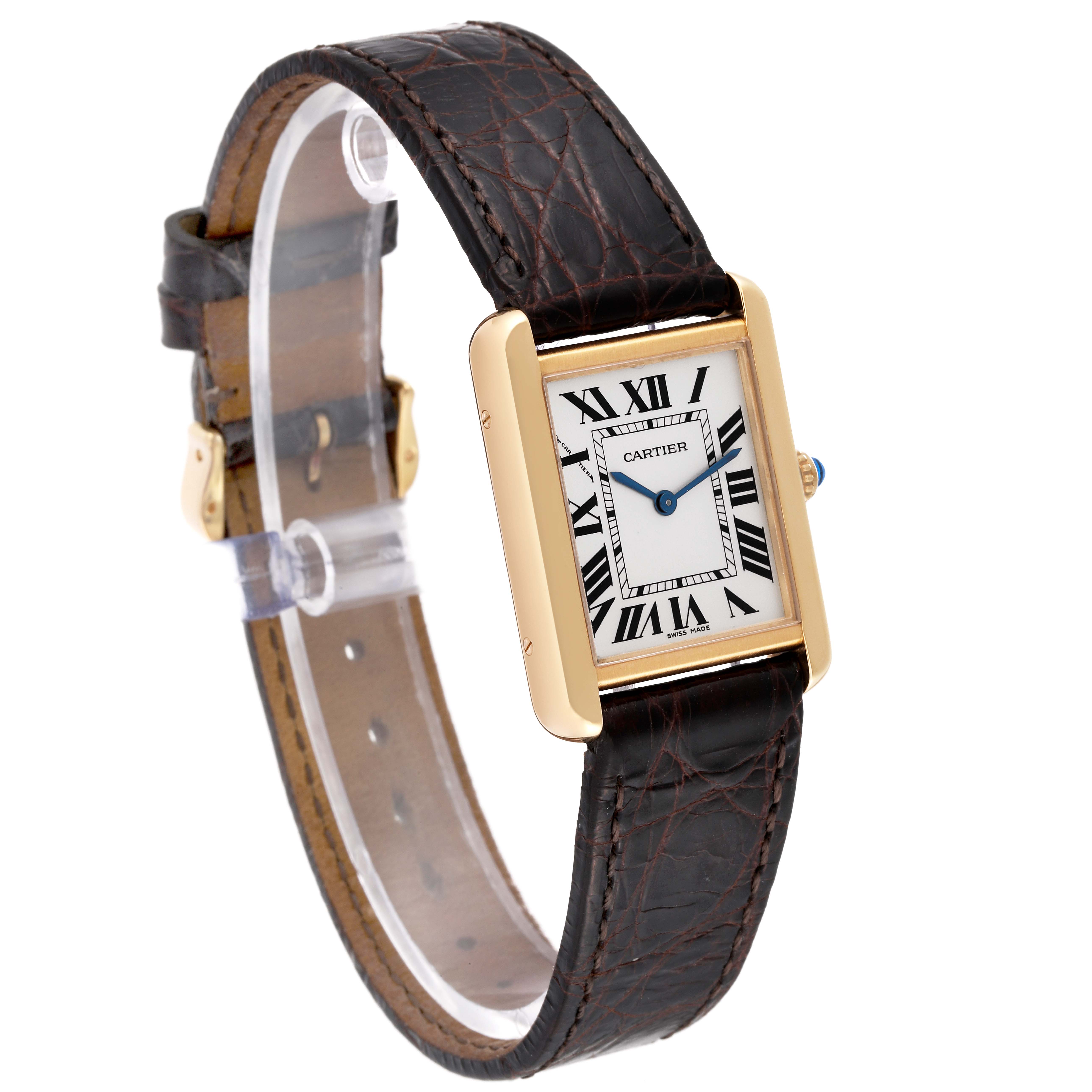 The image shows a Cartier Tank Solo W1018755 Women
s Steel and Gold (two tone) Silver Dial W1018755 Women
s Steel and Gold (two tone) Silver Dial watch angled slightly from the left, highlighting its rectangular face and leather strap.