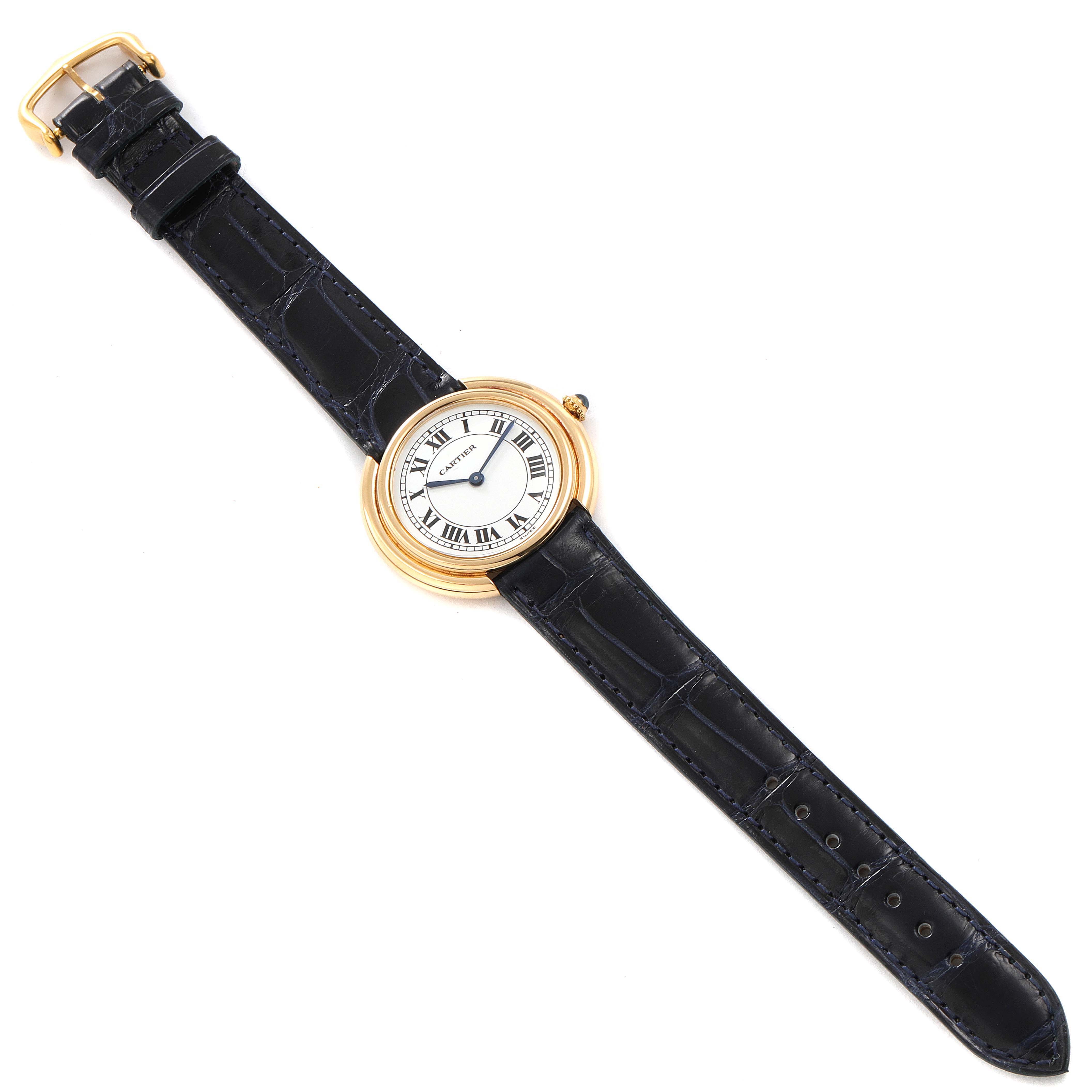 The image shows a top-down view of a Cartier Vendome Women's Yellow Gold Silver Dial Women's Yellow Gold Silver Dial watch, featuring its face, strap, and clasp.