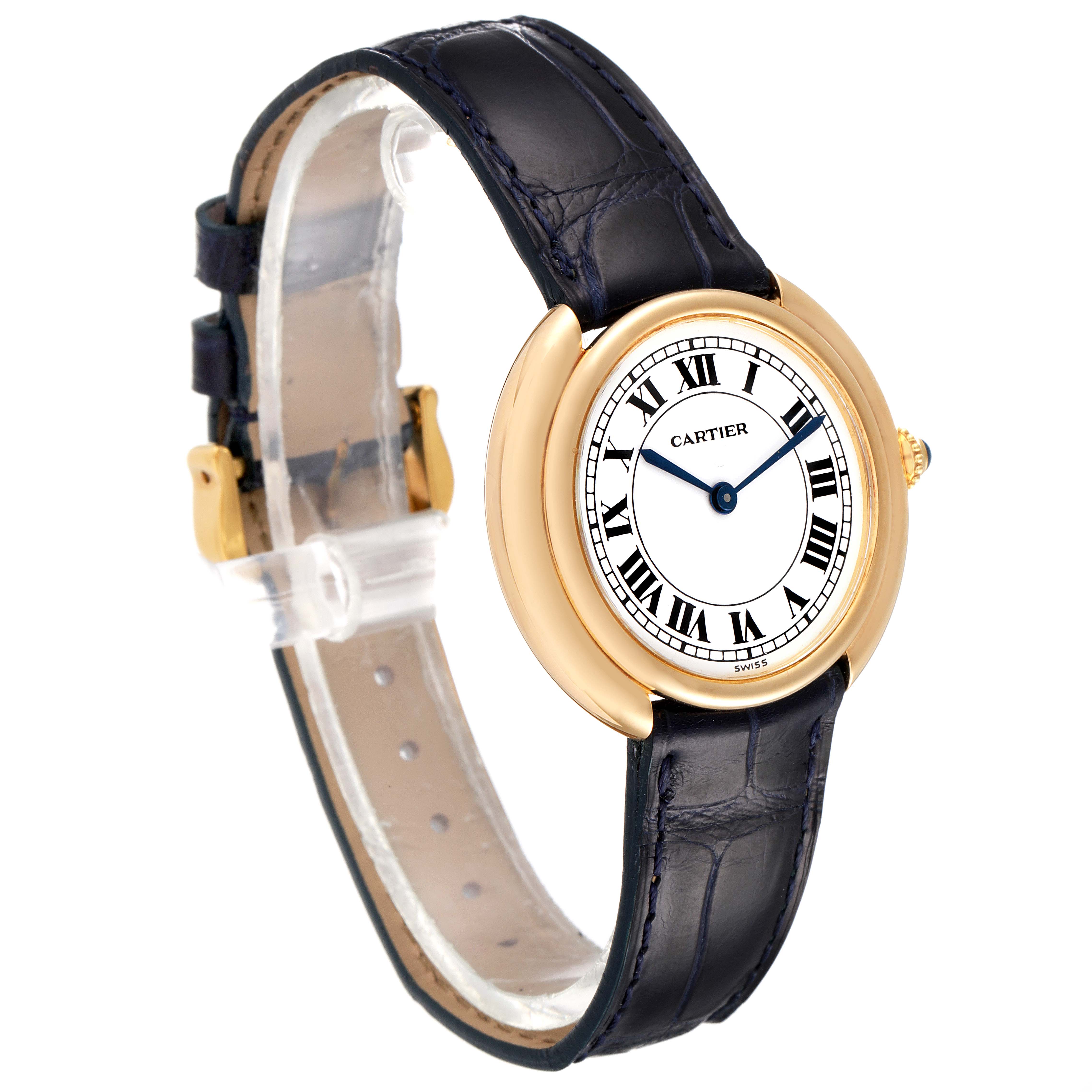 The Cartier Vendome Women's Yellow Gold Silver Dial Women's Yellow Gold Silver Dial model watch is shown at a three-quarter angle, displaying its round face, gold bezel, and black leather strap.