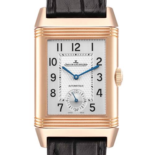 The Jaeger-LeCoultre Reverso watch is shown from the front, displaying its rectangular case, dial, crown, and part of the strap.