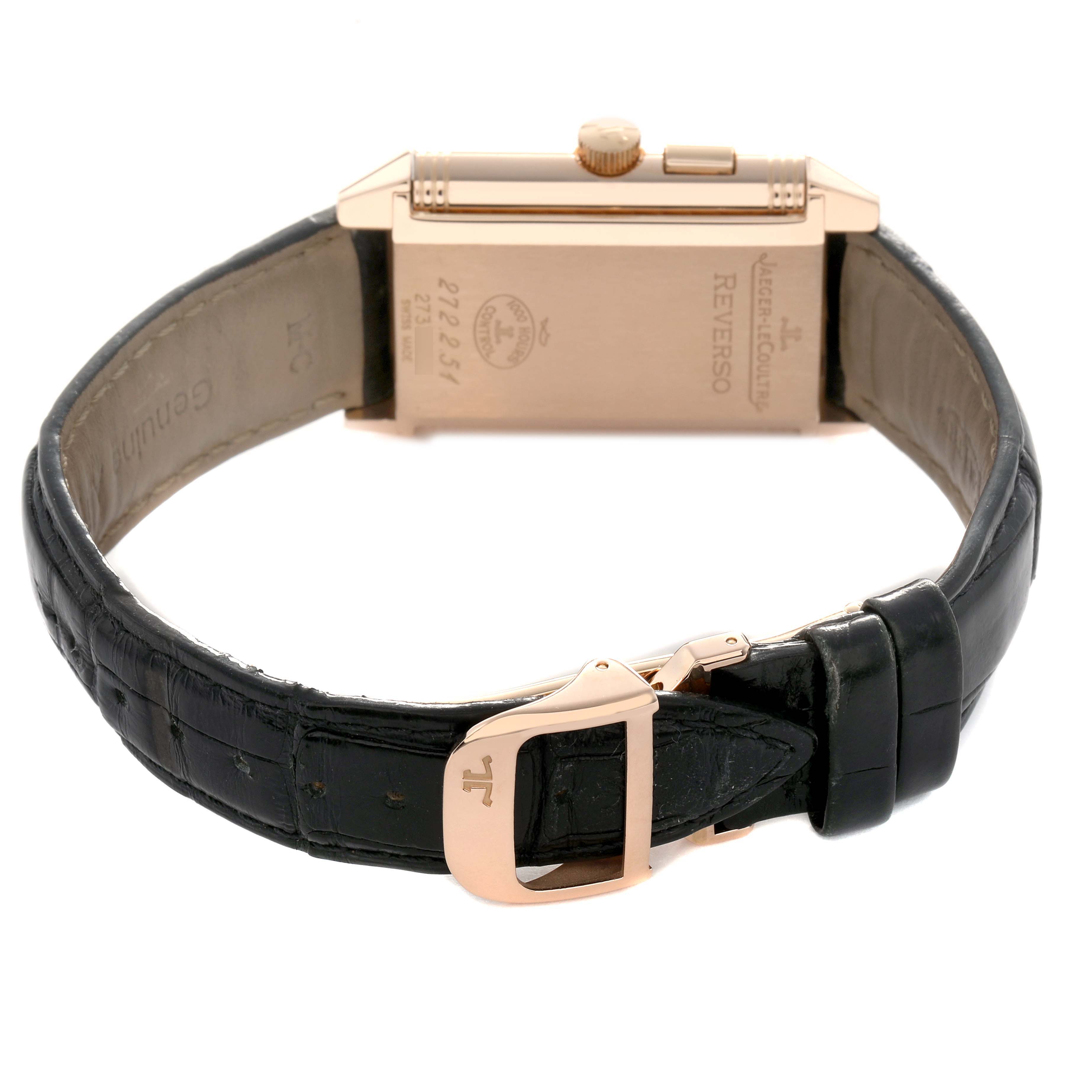 The image shows the reverse case and strap of a Jaeger-LeCoultre Reverso watch, including the crown and clasp.