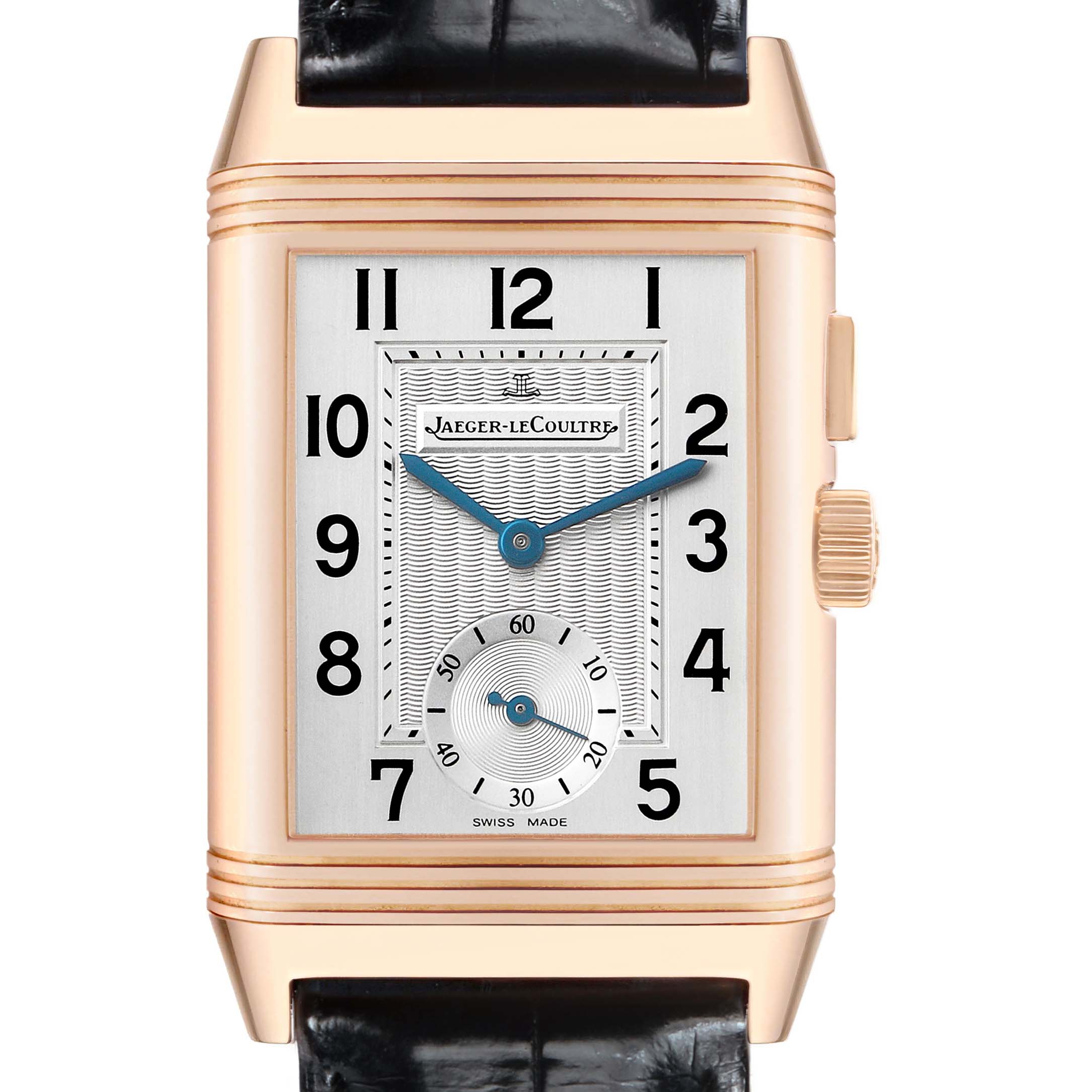 The Jaeger-LeCoultre Reverso watch is shown from the front, displaying its dial, crown, and top of the leather strap.