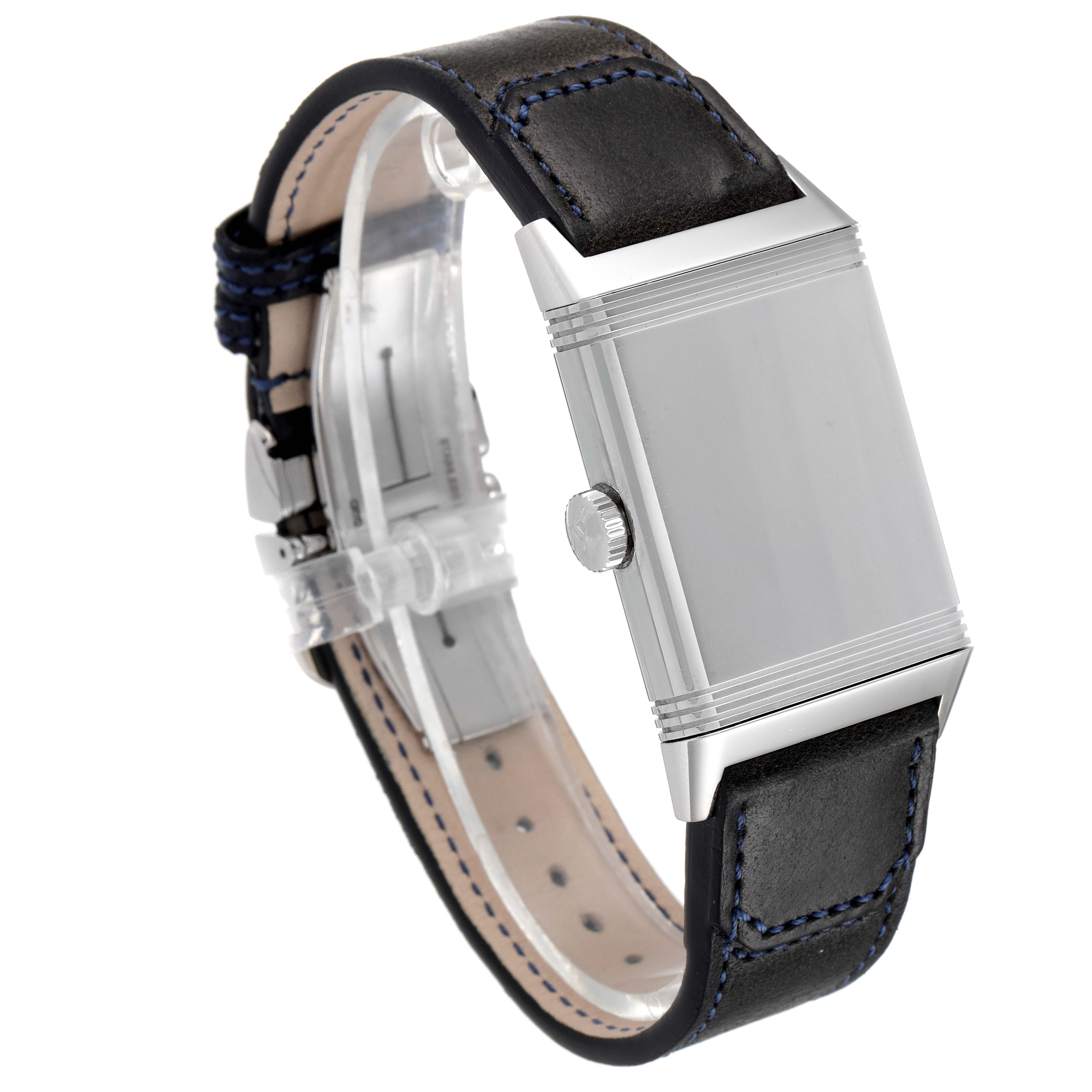 This image shows a side view of the Jaeger LeCoultre Reverso Q3978480 Men's Stainless Steel Blue Dial Q3978480 Men's Stainless Steel Blue Dial watch, highlighting its case, crown, and black leather strap.