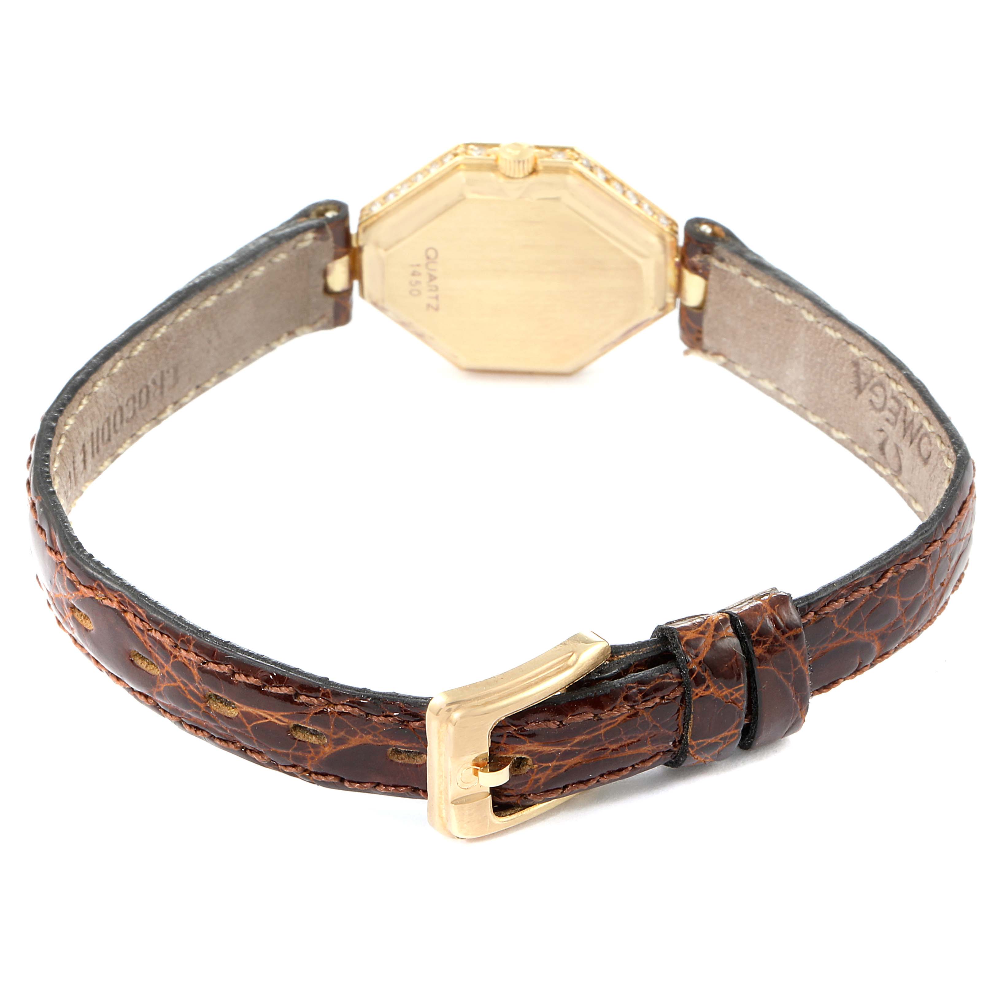 This image shows the back of the Omega 1450 Women
s Yellow Gold Champagne Dial 1450 Women
s Yellow Gold Champagne Dial DeVille Mini Yellow Gold Diamond Cocktail Ladies Watch 1450 model, including the strap and buckle.