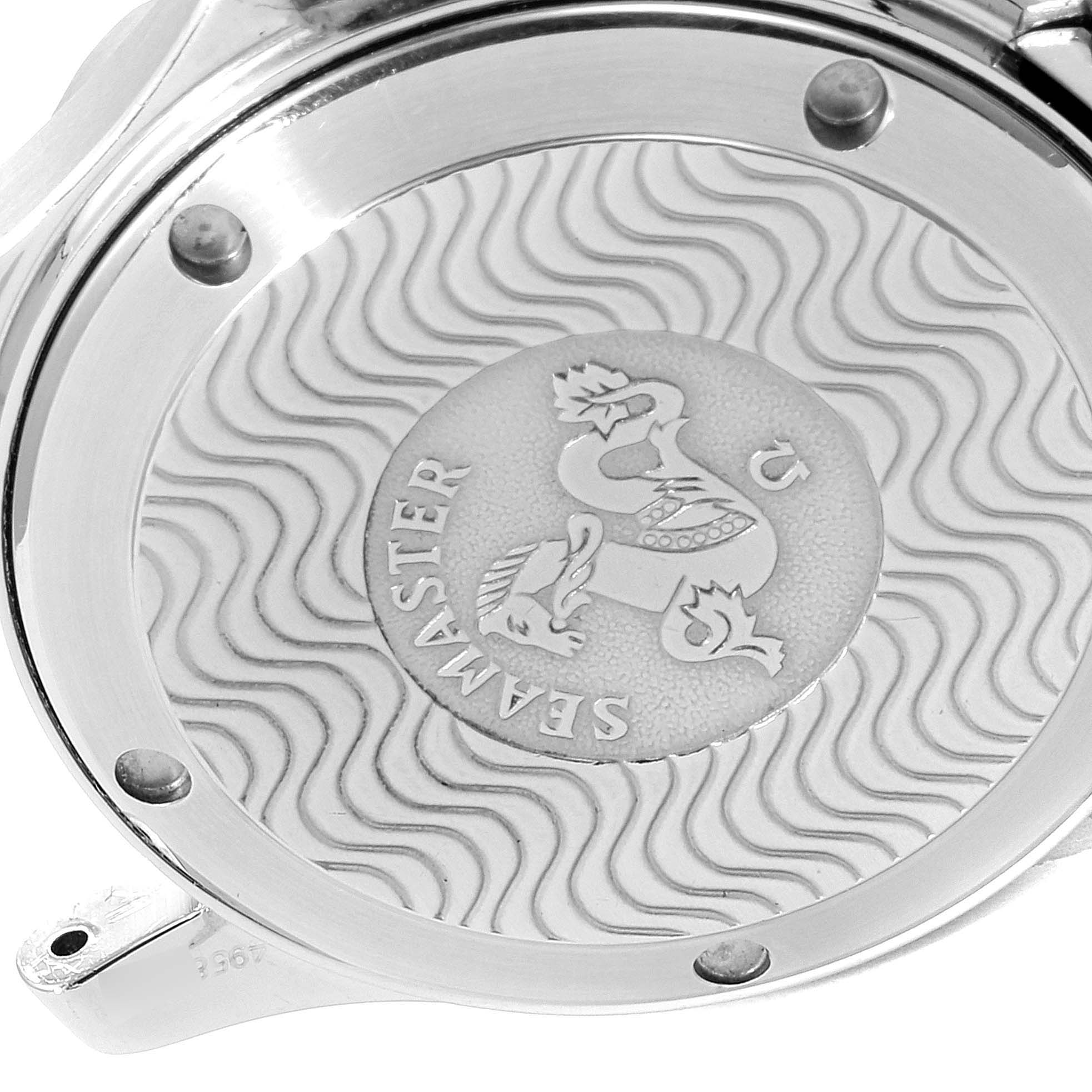 The image shows the detailed back case of an Omega Seamaster 2551.80.00 Men's Stainless Steel Blue Dial 2551.80.00 Men's Stainless Steel Blue Dial watch from a close-up angle, focusing on its engravings and logo.