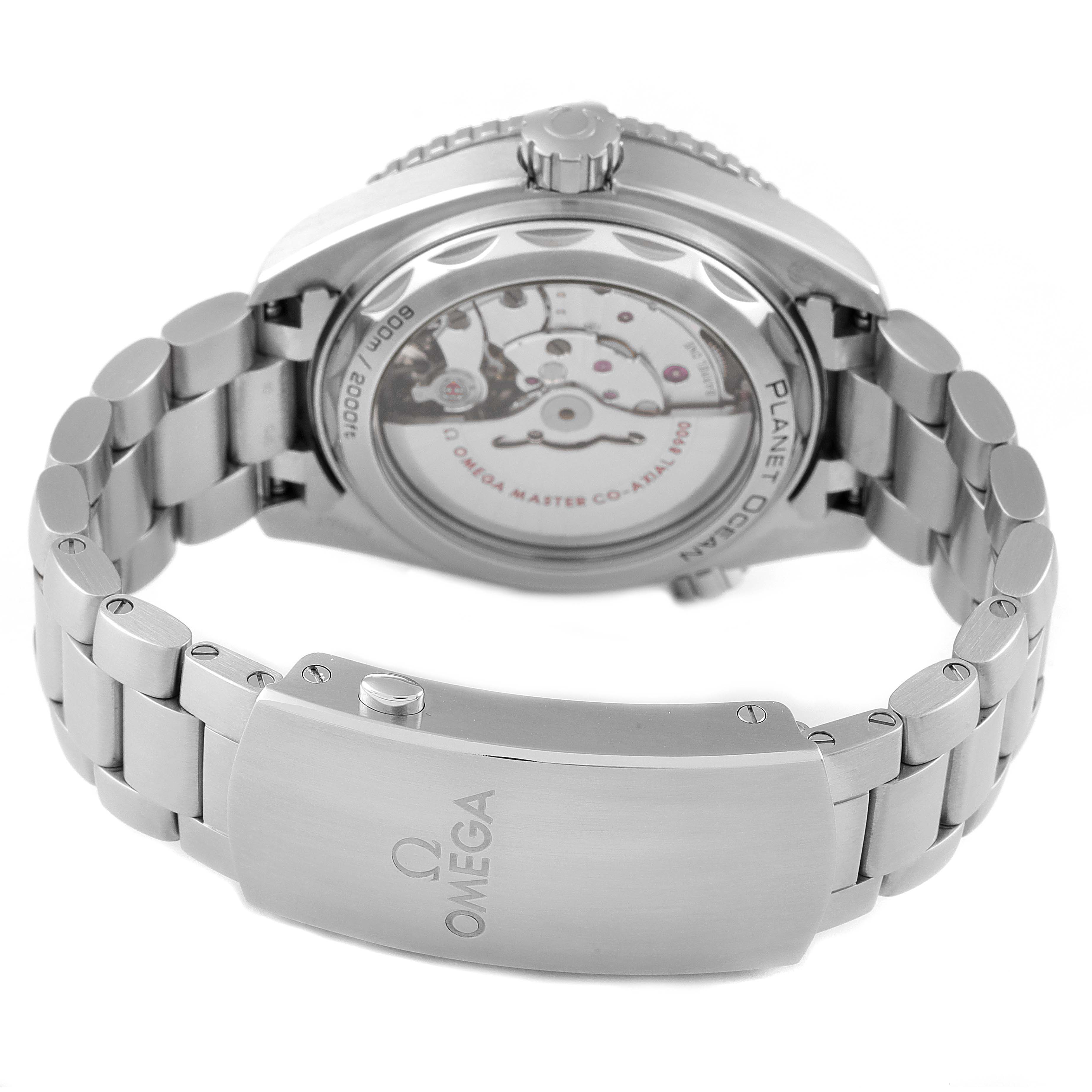 This Omega Planet Ocean 215.30.44.21.03.001 Men's Stainless Steel Blue Dial 215.30.44.21.03.001 Men's Stainless Steel Blue Dial watch is shown from the back, highlighting its exhibition case back and stainless steel bracelet.