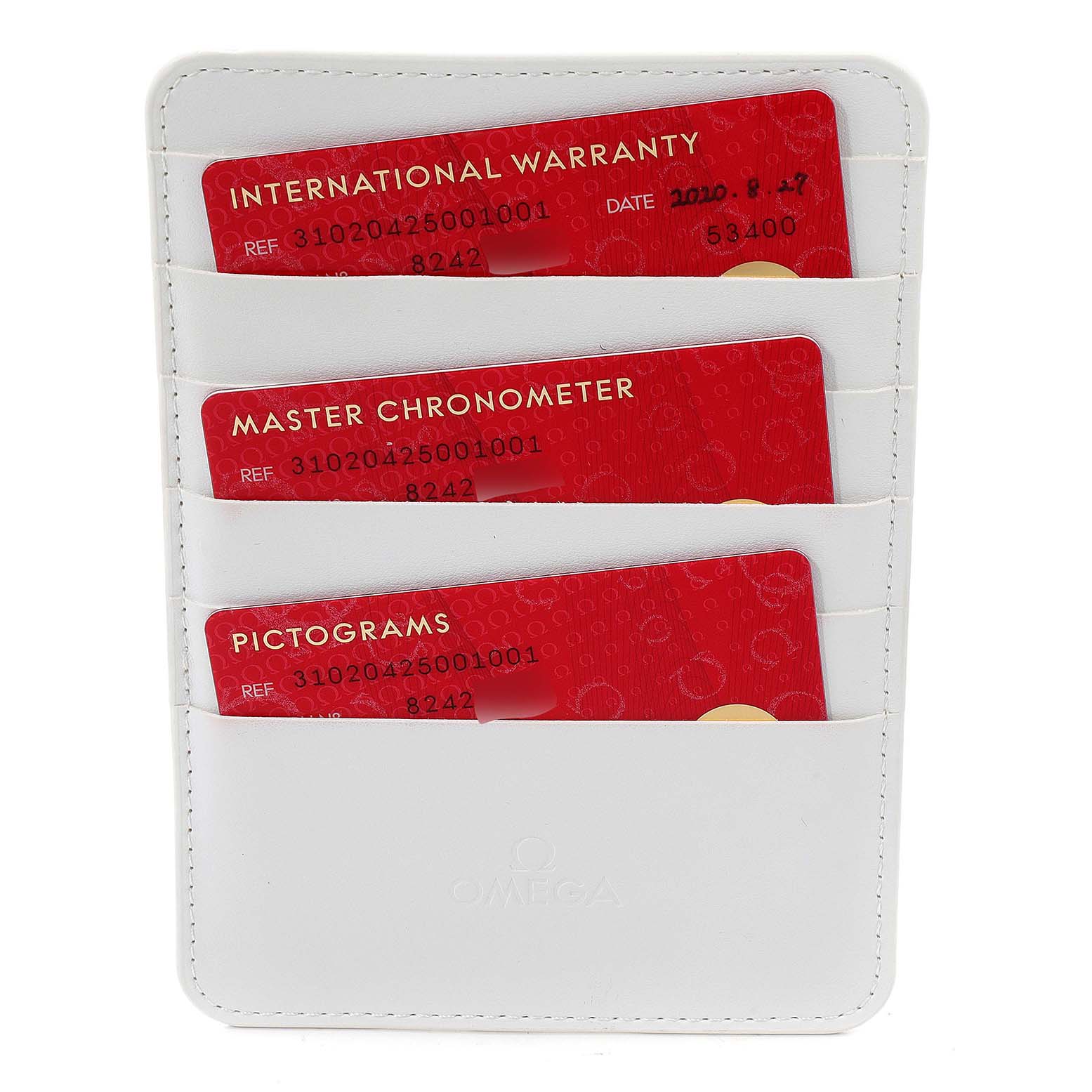 The image shows the warranty cards for an Omega Speedmaster 310.20.42.50.01.001 Men's Stainless Steel Grey Dial 310.20.42.50.01.001 Men's Stainless Steel Grey Dial watch, neatly placed in a white cardholder.