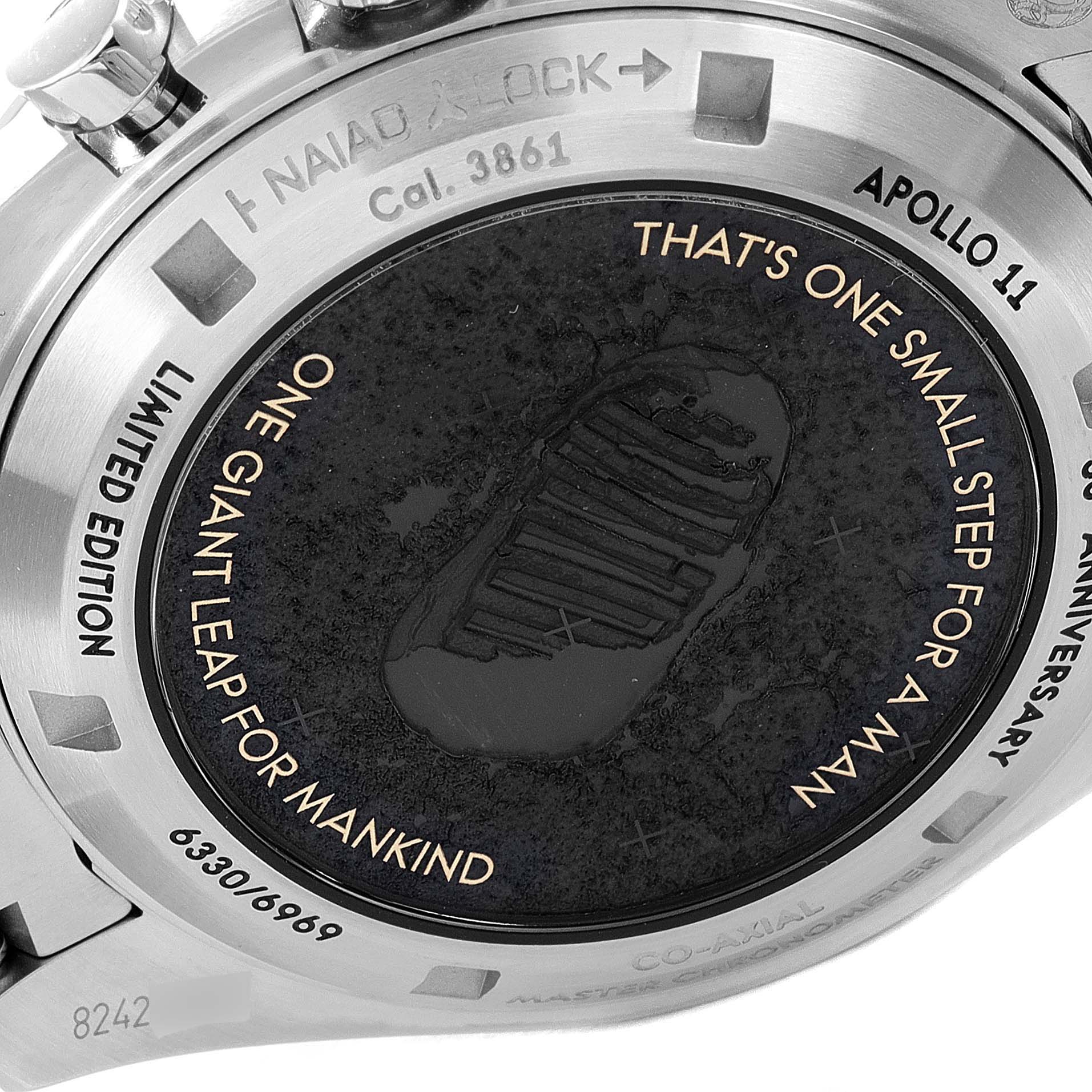 The image shows the back case of an Omega Speedmaster 310.20.42.50.01.001 Men's Stainless Steel Grey Dial 310.20.42.50.01.001 Men's Stainless Steel Grey Dial watch, featuring Apollo 11 commemorative engravings.