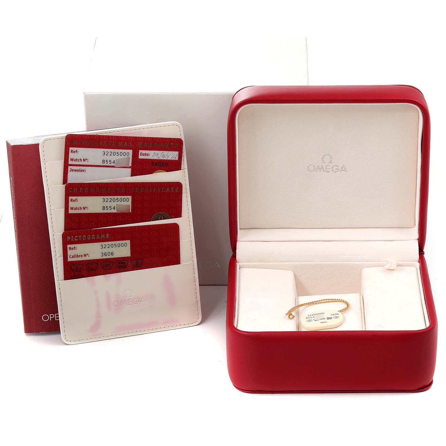 This image shows the Omega Speedmaster 3220.50.00 Men's Stainless Steel Black Dial 3220.50.00 Men's Stainless Steel Black Dial watch packaging, including the warranty cards and watch box from an angled side view.