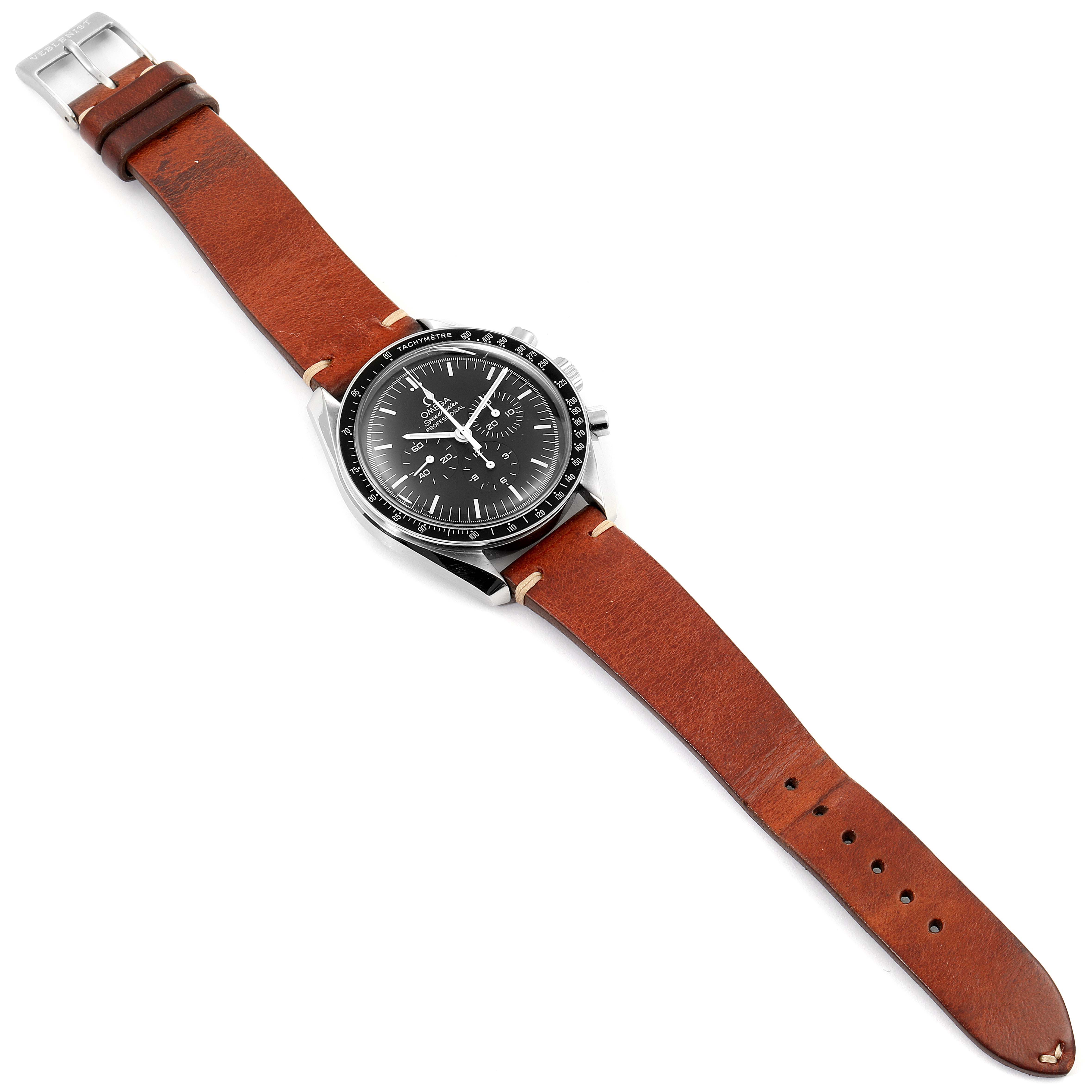 The image shows an Omega Speedmaster 311.33.42.30.01.001 Men's Stainless Steel Black Dial 311.33.42.30.01.001 Men's Stainless Steel Black Dial watch with a brown leather strap viewed from above.