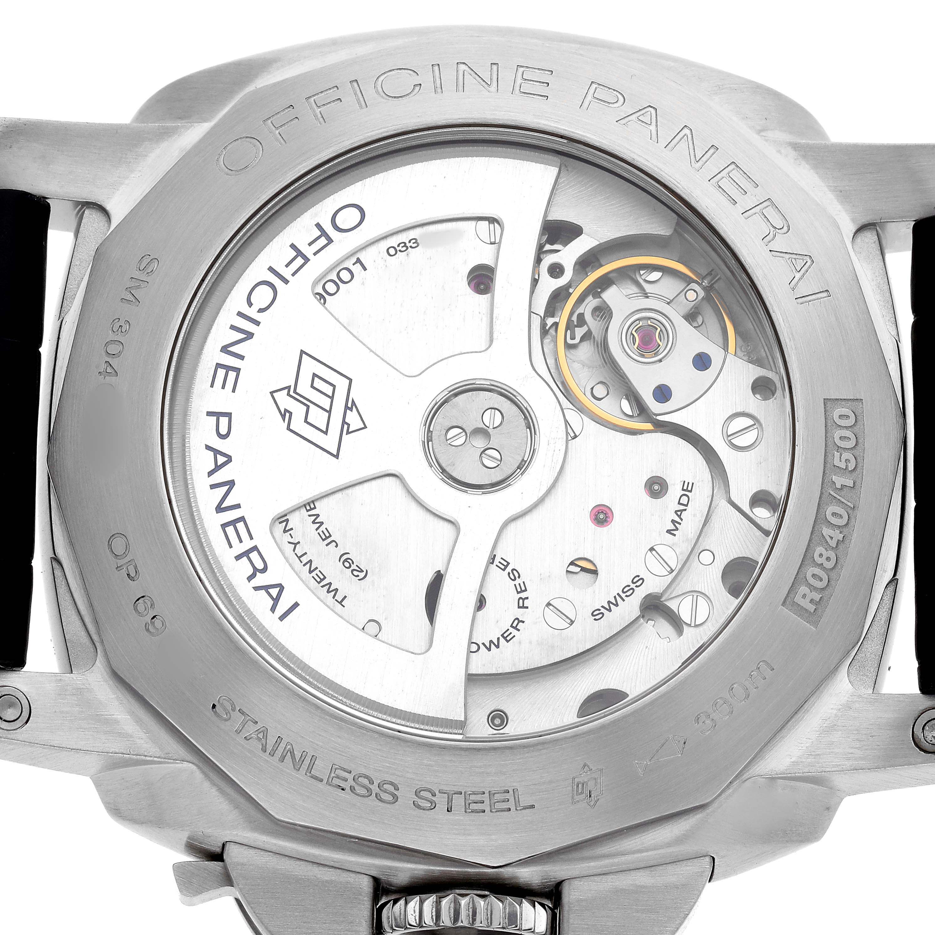 The image shows the back view of a Panerai Luminor PAM00320 Men's Stainless Steel Black Dial watch, highlighting its stainless steel casing and internal mechanisms.