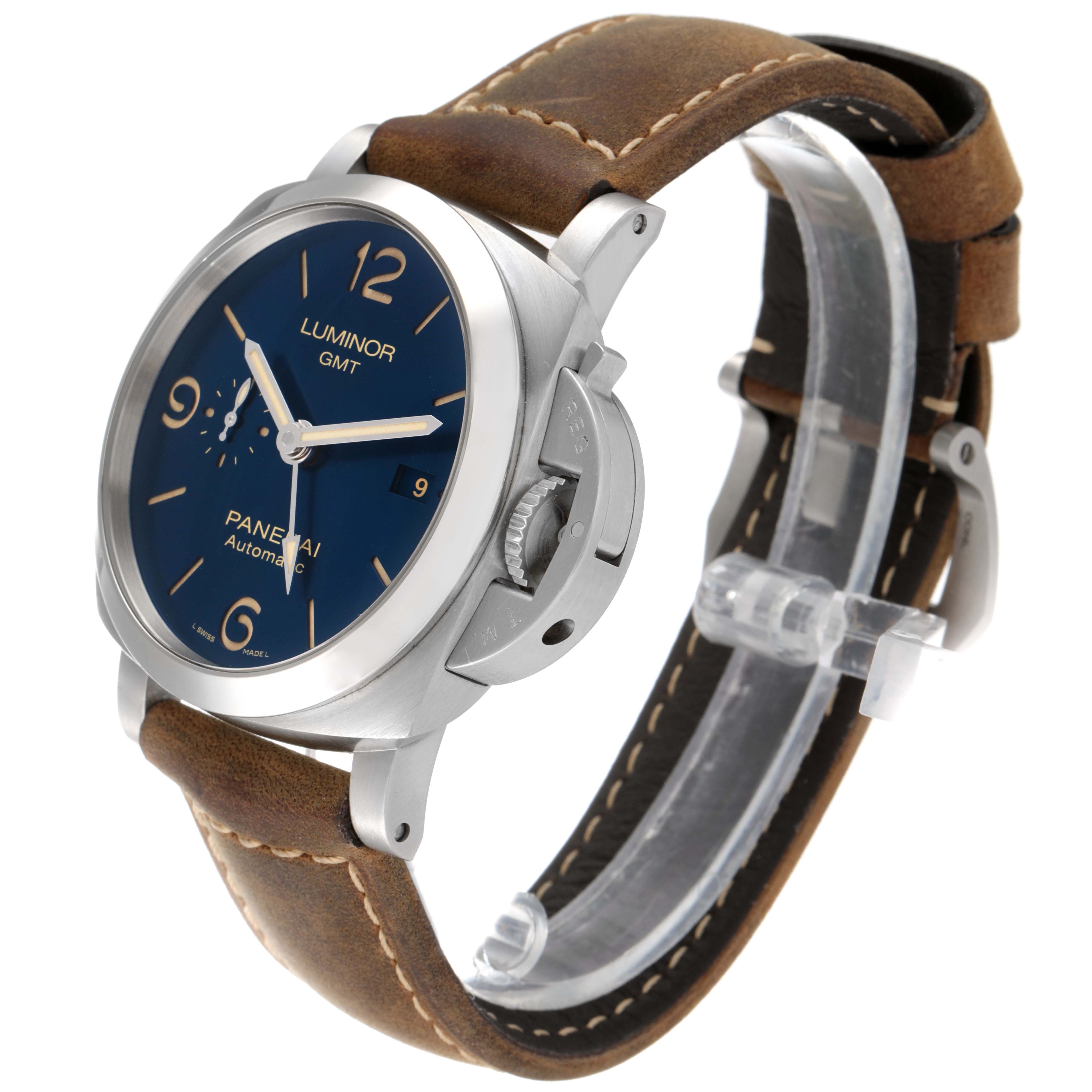 The image shows a Panerai Luminor PAM01033 Men's Stainless Steel Blue Dial PAM01033 Men's Stainless Steel Blue Dial GMT watch from a three-quarter angle highlighting its brown leather strap and blue dial.