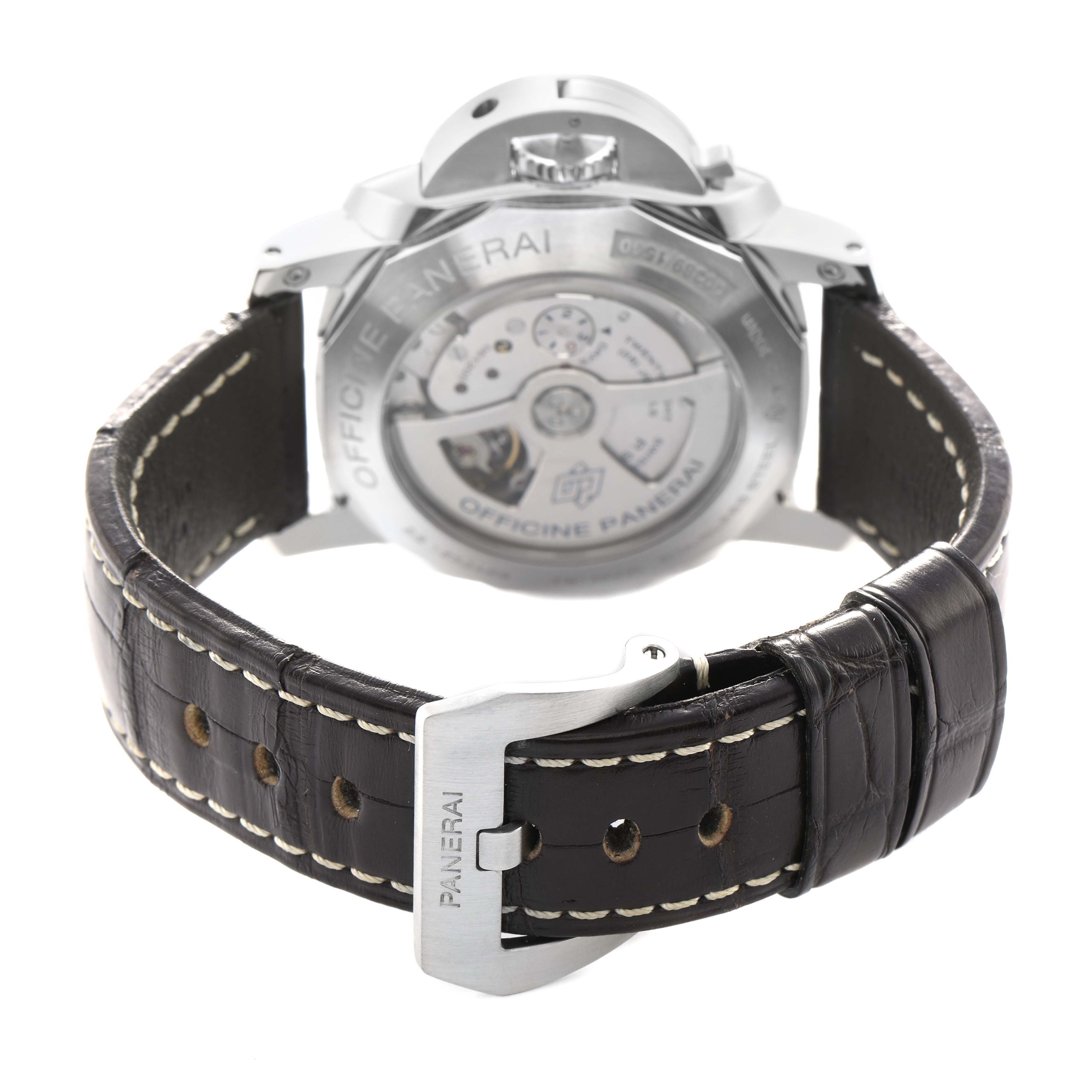 The image shows the back of the Panerai Luminor PAM00531 Men's Stainless Steel Black Dial watch, highlighting the movement and leather strap with a buckle.