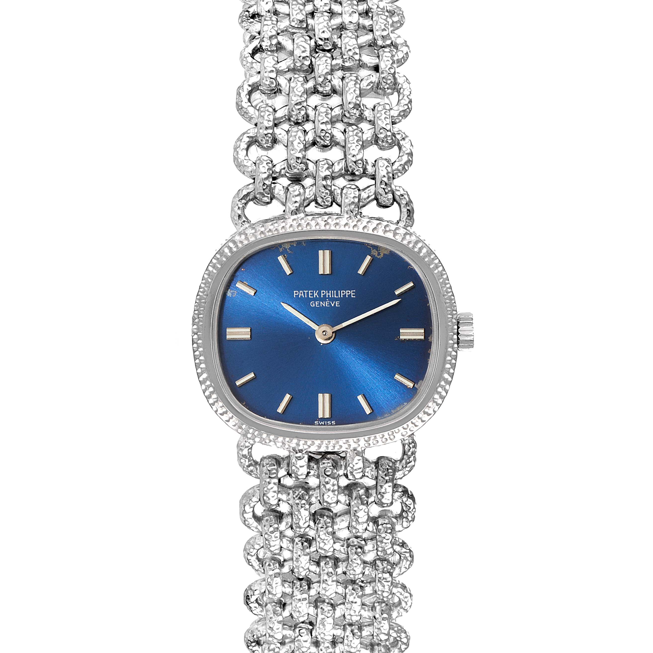 The image is a top-view of the Patek Philippe Golden Ellipse 4133 Women's White Gold Blue Dial 4133 Women's White Gold Blue Dial watch, showing its blue dial and intricate silver bracelet.