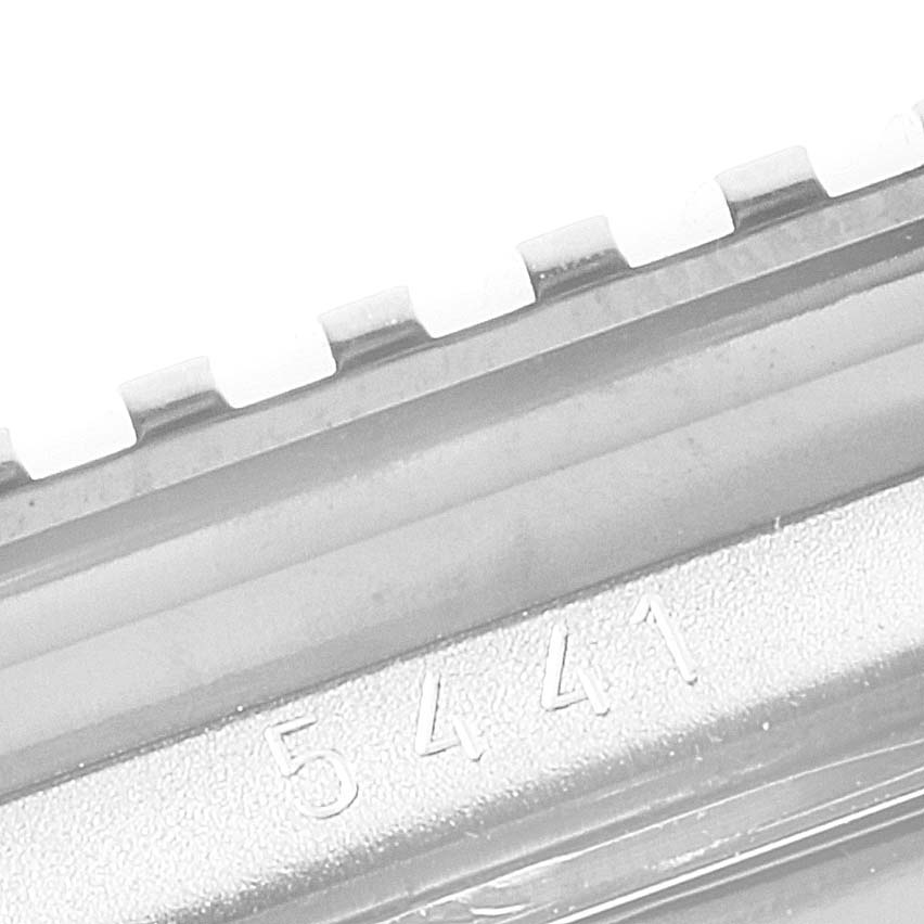 The image shows an engraved number on the edge of a Rolex Cellini 5441 Men's White Gold Silver Dial 5441 Men's White Gold Silver Dial watch case, viewed in close-up.